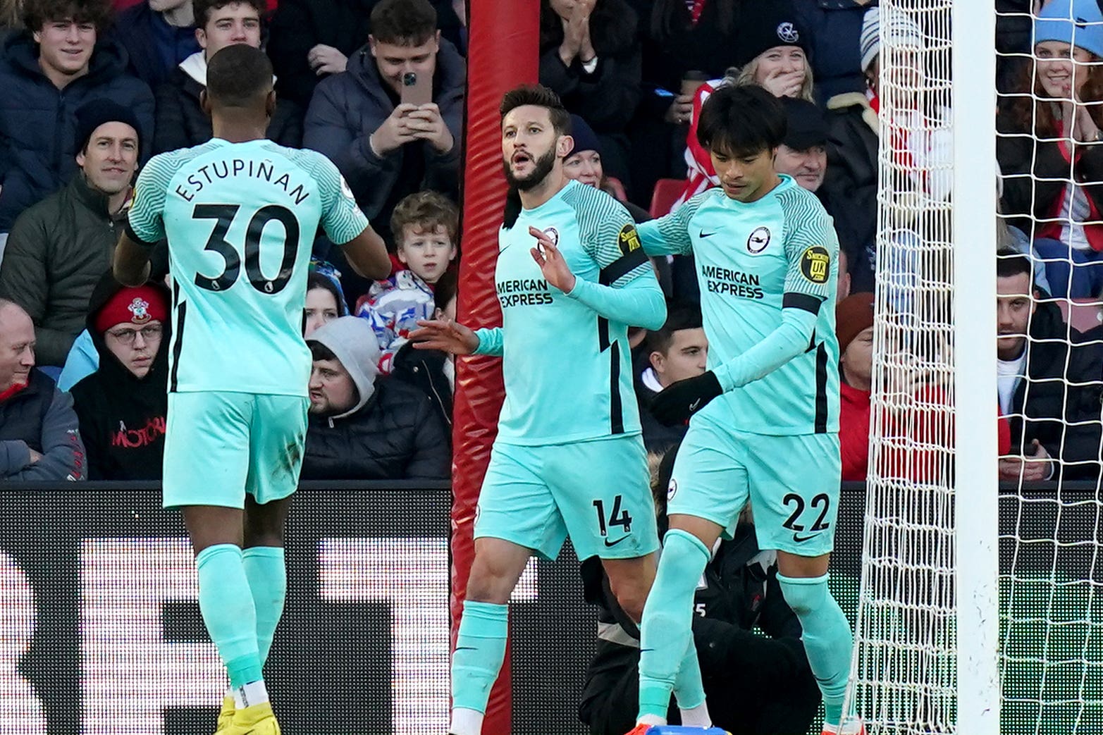 Adam Lallana, second right, reluctantly celebrates the first goal (Adam Davy/PA)