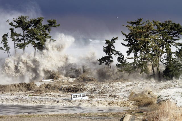 <p>Tsunami waves hitting the coast of Minamisoma in Japan in 2011</p>