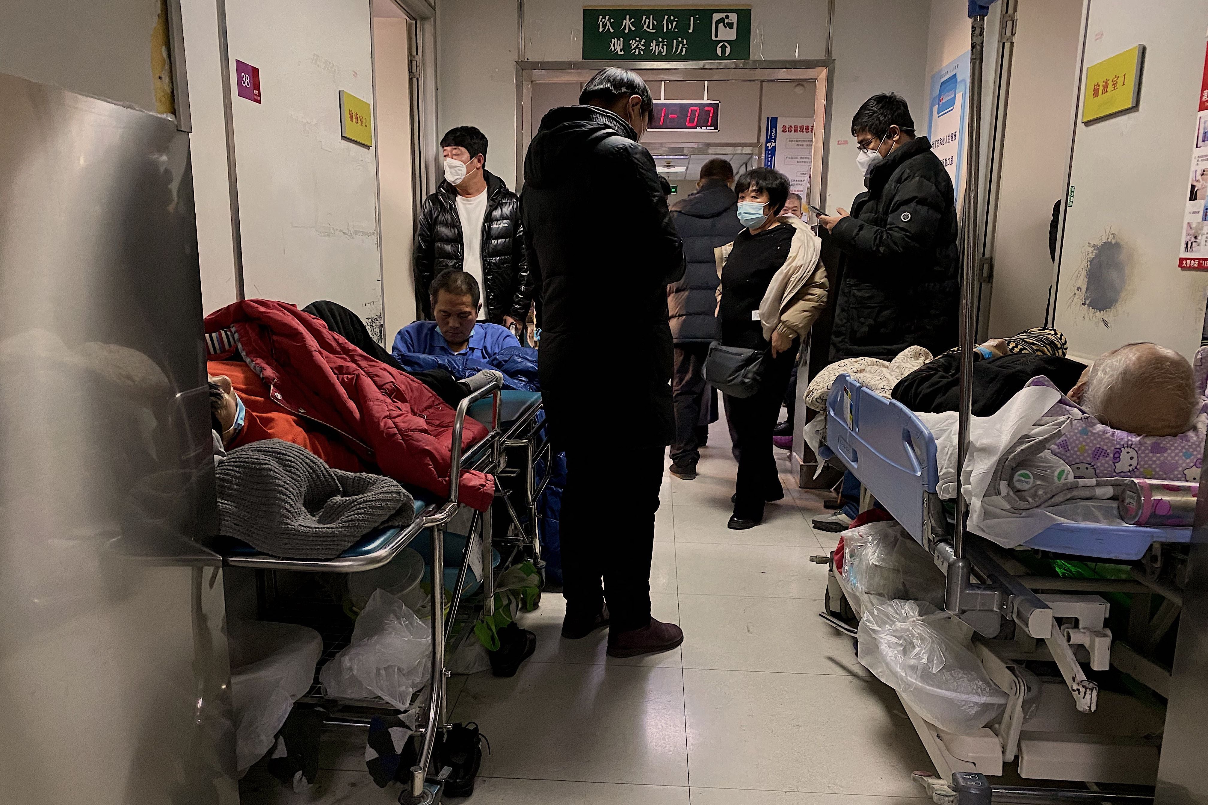 Covid-19 patients on a trolley at Tianjin First Center Hospital