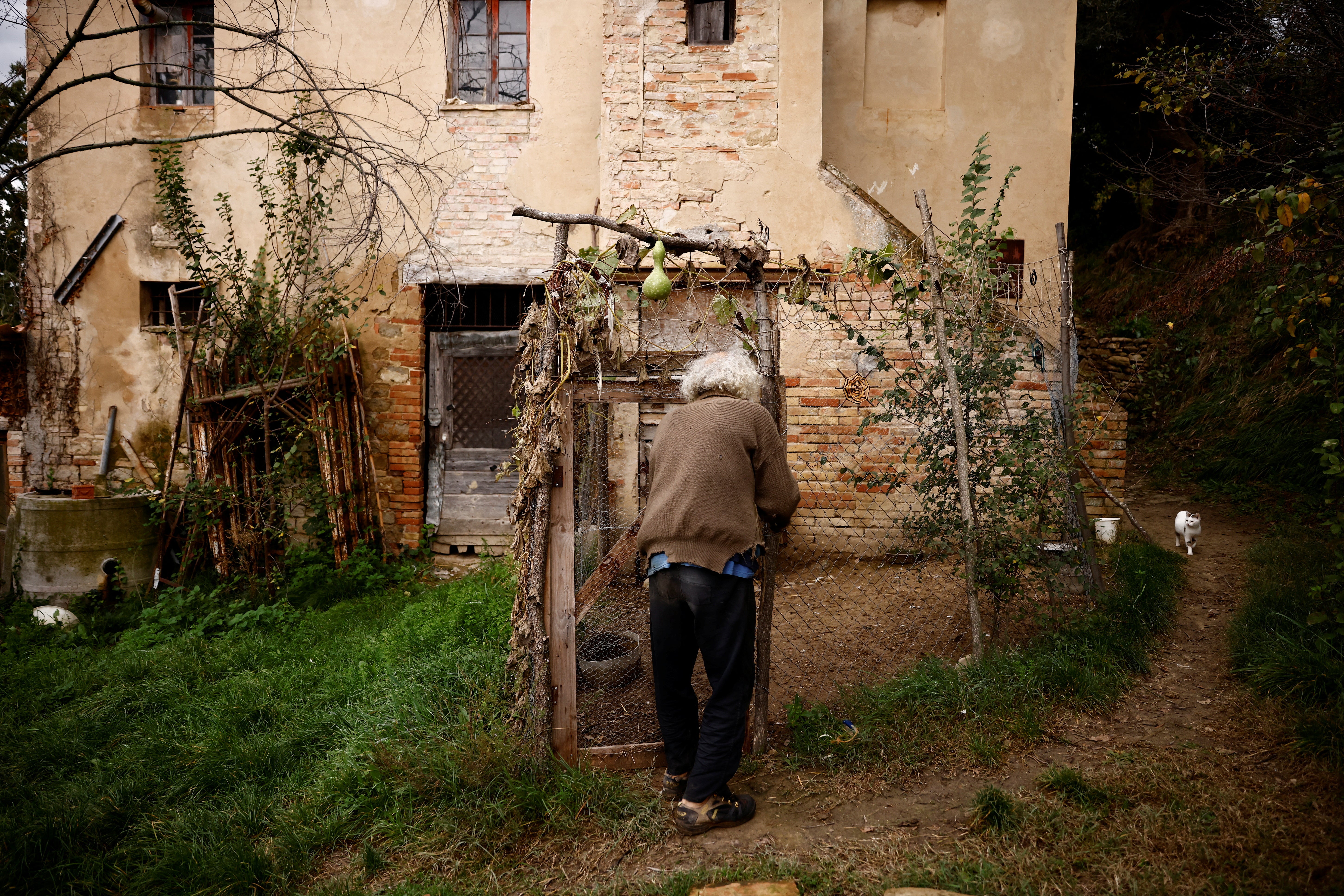 Fabrizio checks the chicken pen