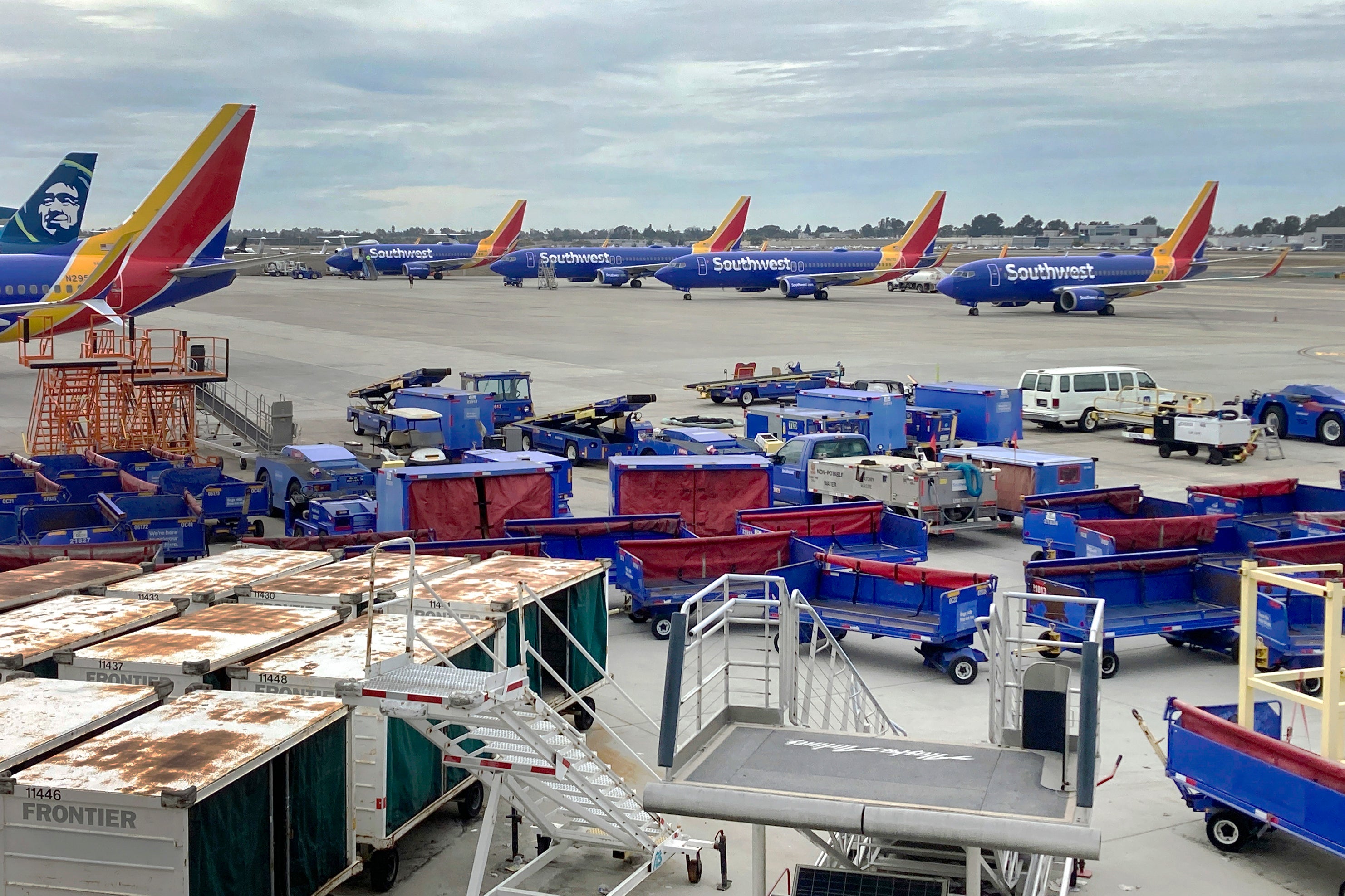 Southwest jets sit idle on a California runway amid thousands of cancellations