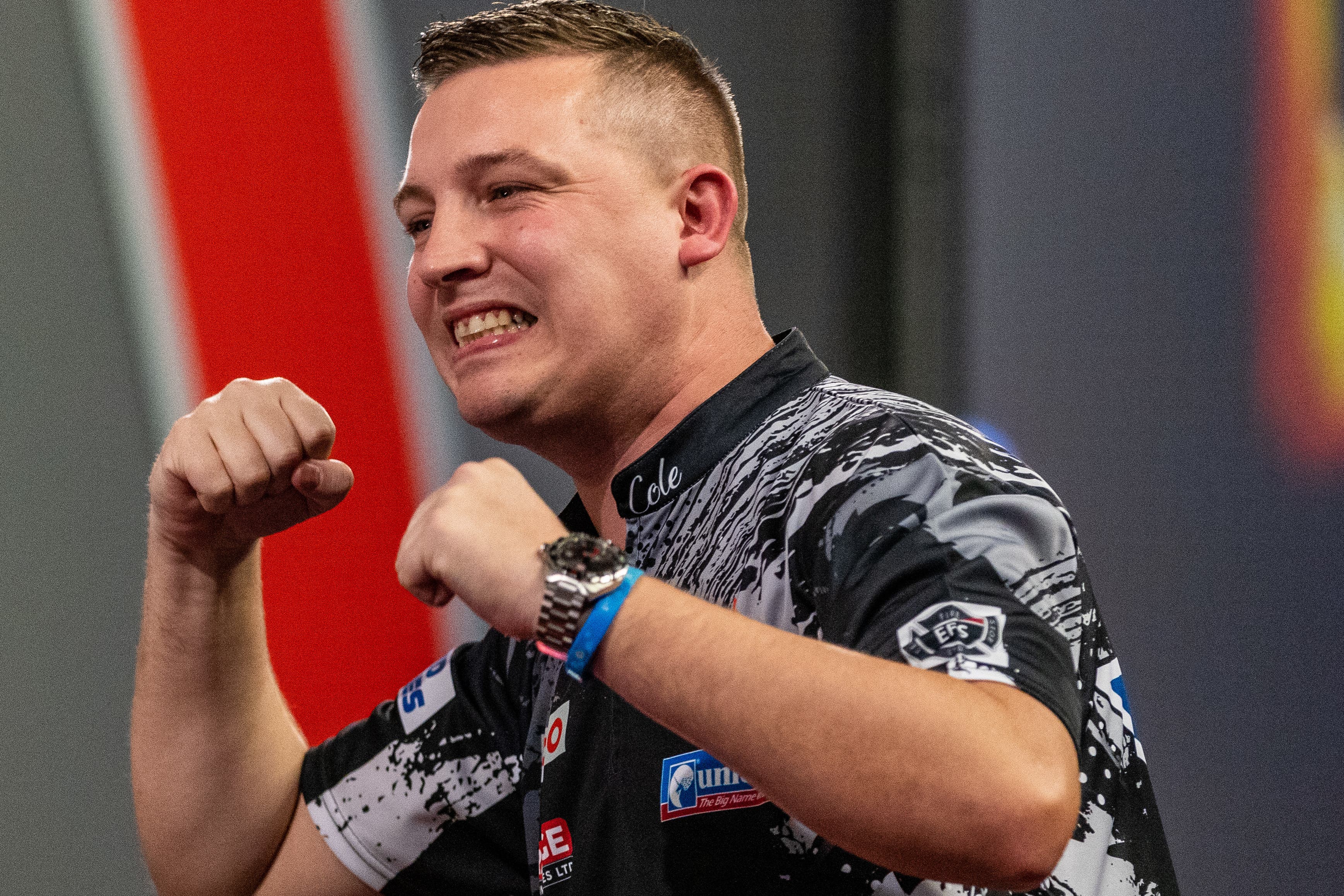 Chris Dobey, pictured, knocked out two-time champion Gary Anderson (Steven Paston/PA)