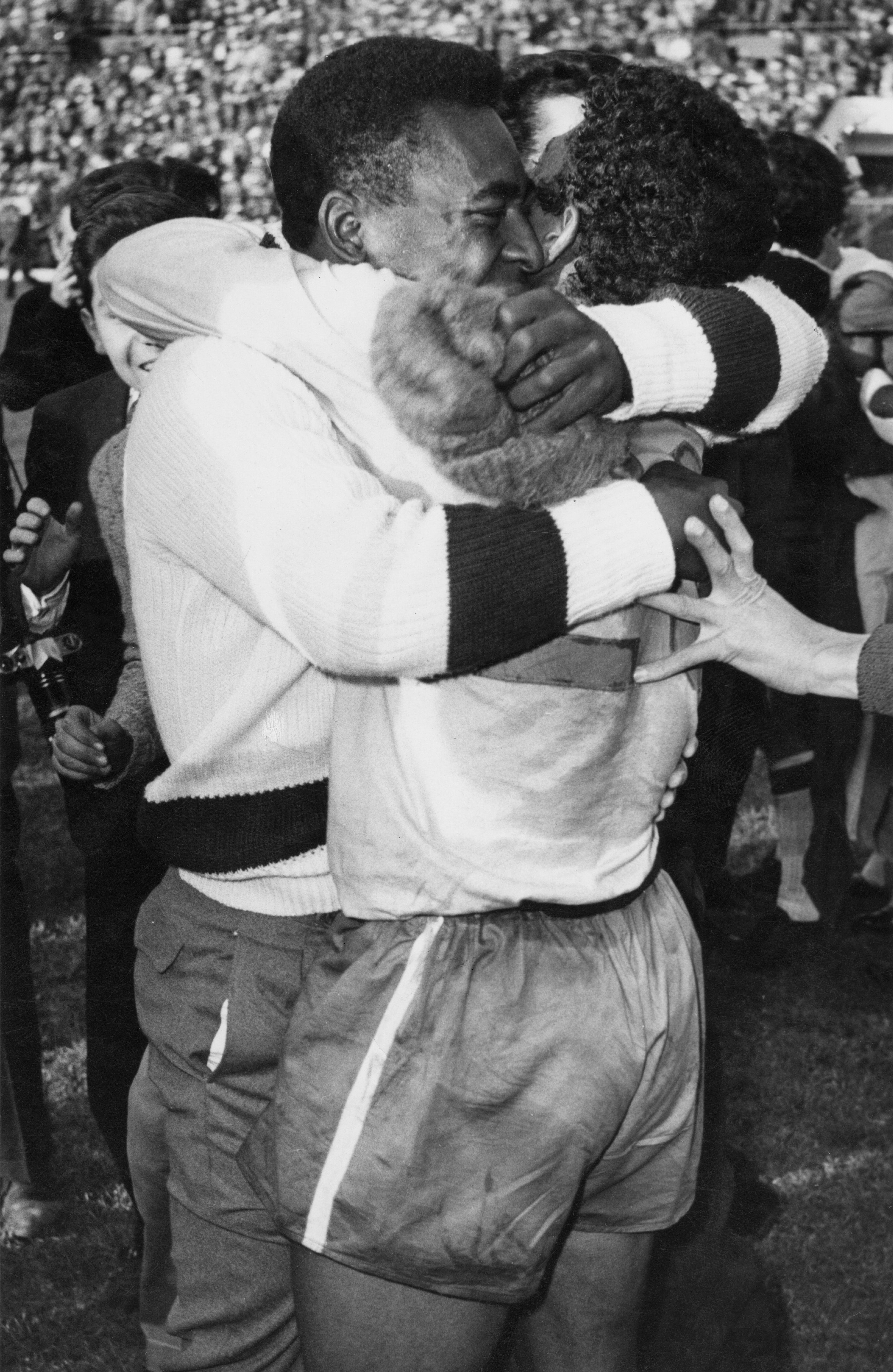 Pele embracing a team mate after Brazil beat Czechoslovakia 3- 1 in the final of the 1962 World Cup, Estadio Nacional, Santiago, Chile, 17th July 1962. Pele missed the final through injury.