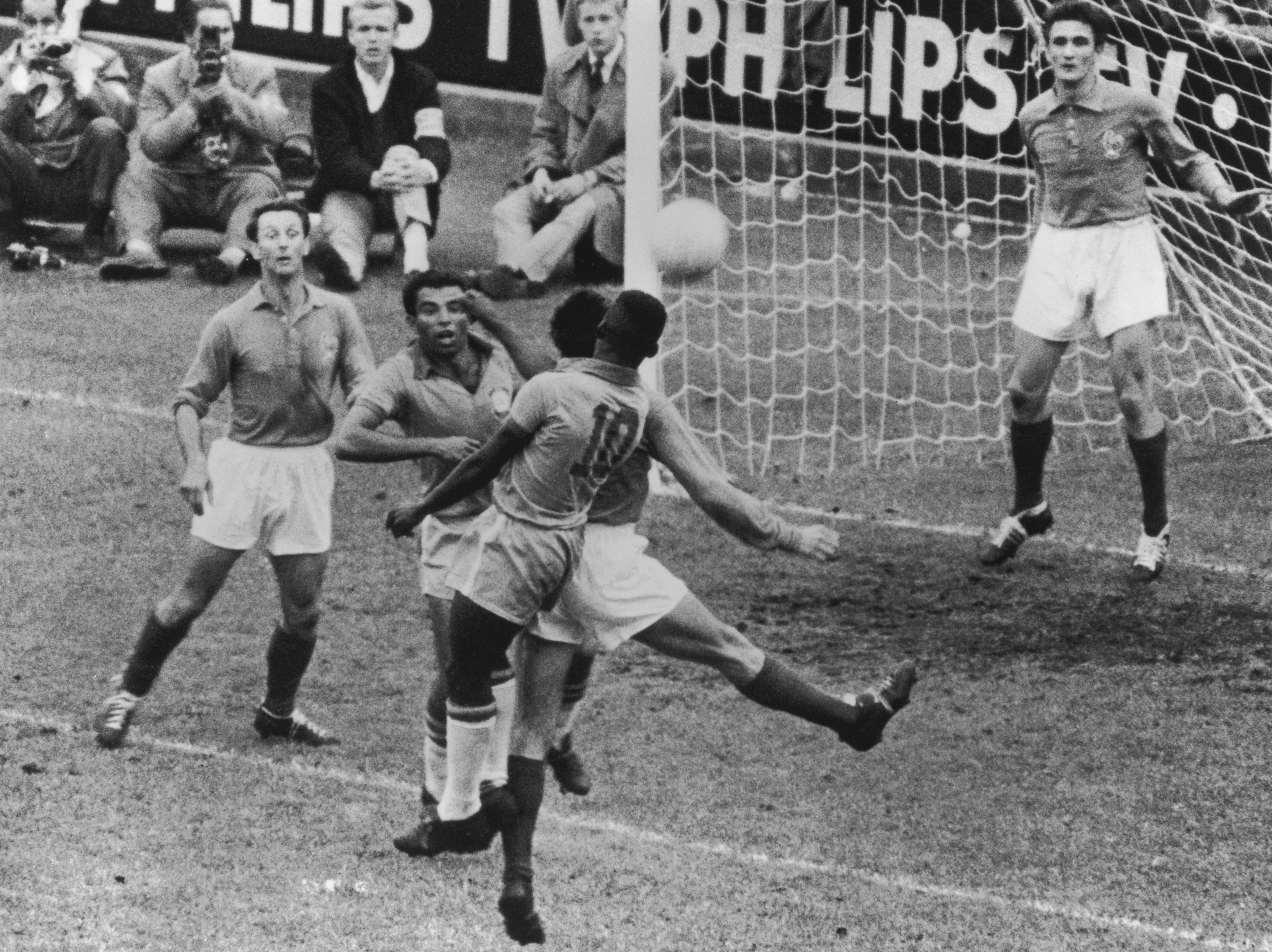 Brazilian forwards Vava and Pele (number 10) enter a melee in front of the French goal during the the World Cup semi-final at the Rasunda Stadion in Solna, Stockholm, 24th June 1958. Brazil beat France 5-2.