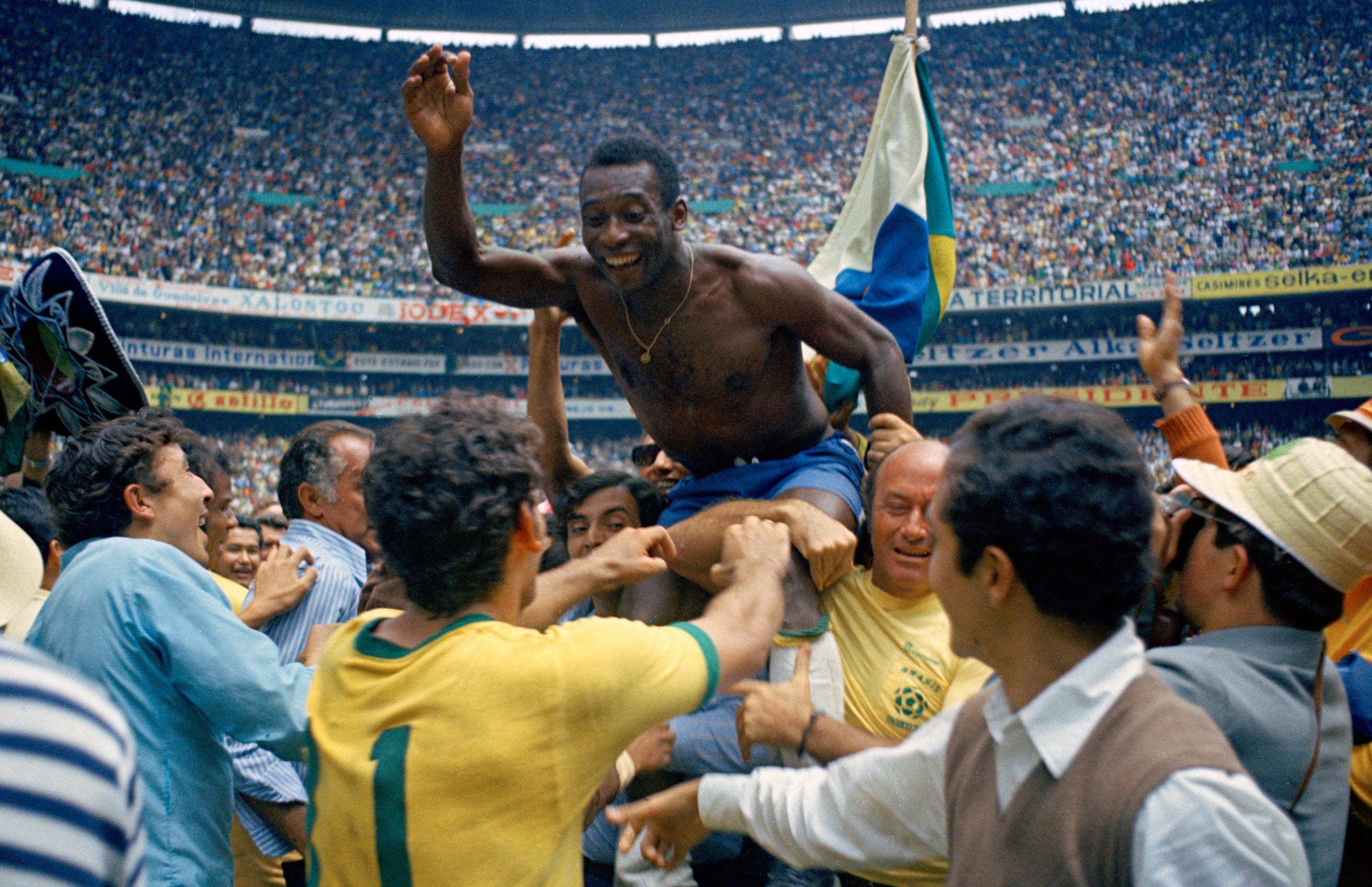 Pele is hoisted on the shoulders of his teammates after Brazil won the World Cup final against Italy, 4-1, in Mexico City’s Estadio Azteca, June 21, 1970.