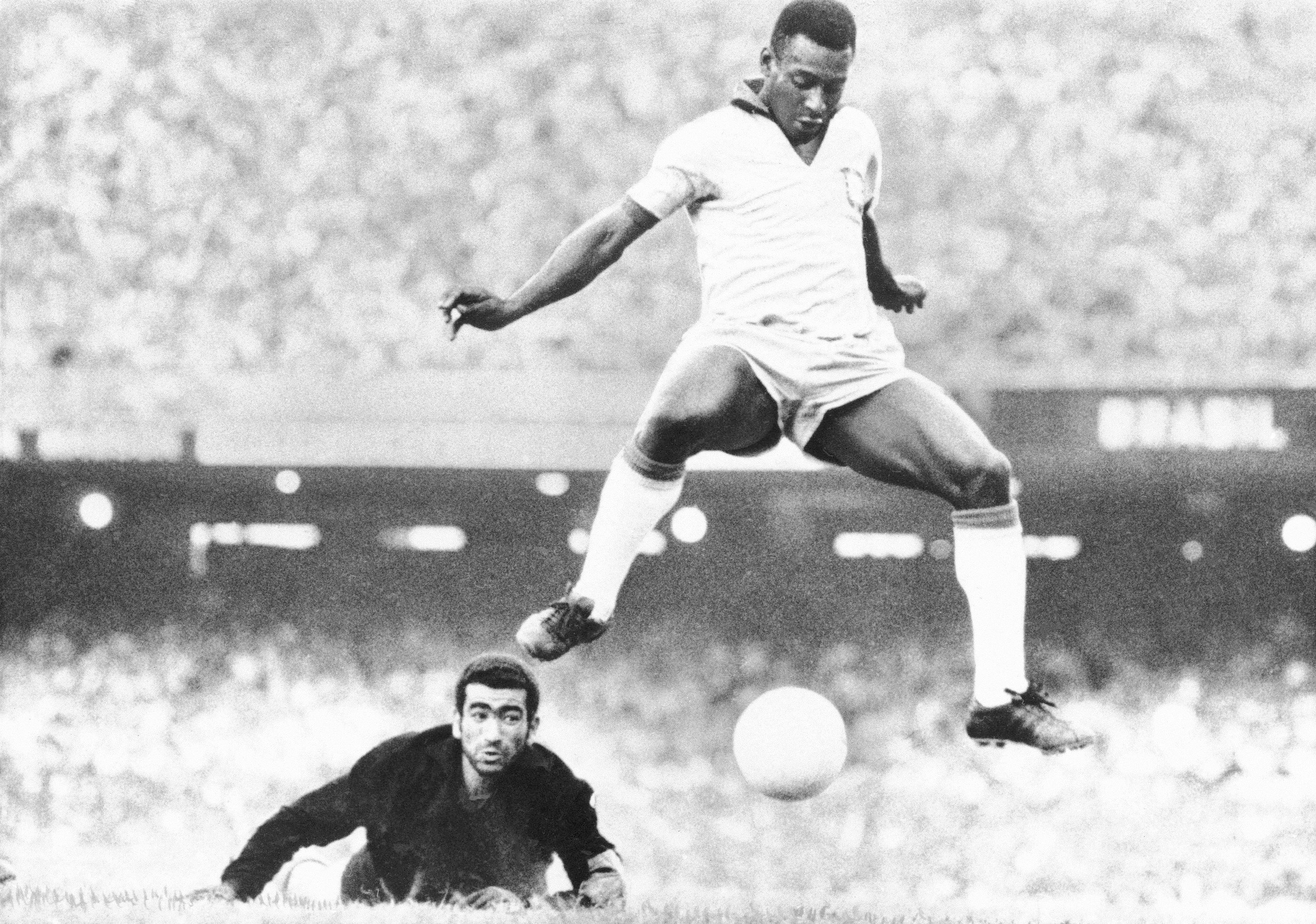 Pele scores past Venezuela's goal keeper Fabrizio Fasano in Rio de Janeiro, Brazil, 24 August, 1969