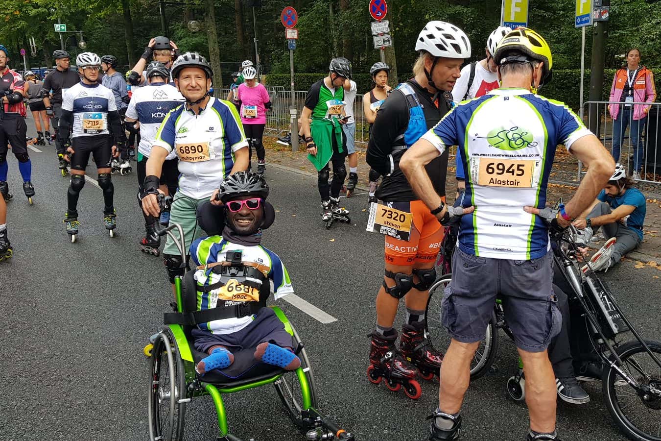 Isaac Harvey (in the wheelchair) and organiser Muhayman Jamil standing behind him (Wheels and Wheelchairs)