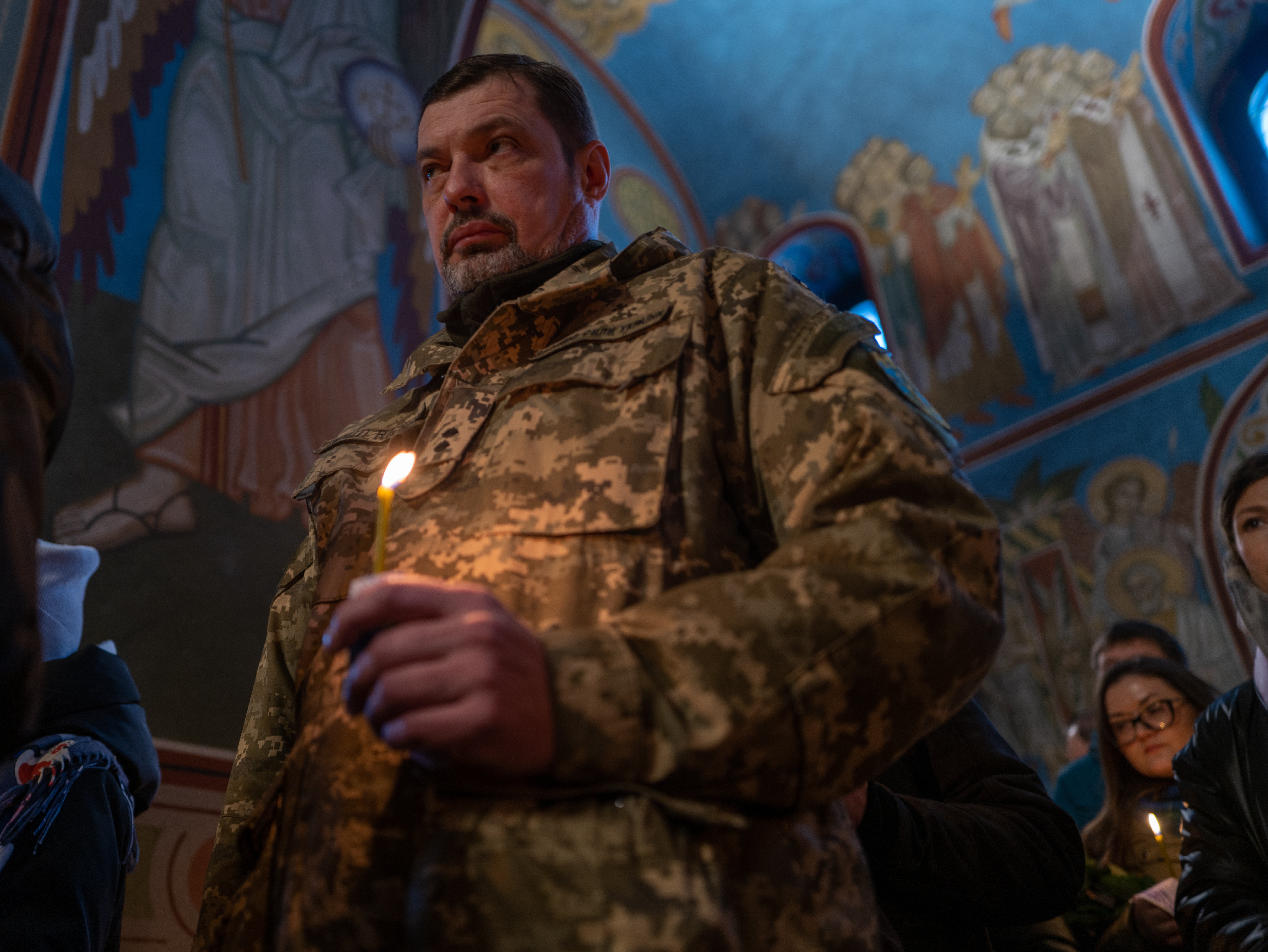 People attend the funeral for Ukrainian soldier Gennadiy Afanasyev, 32