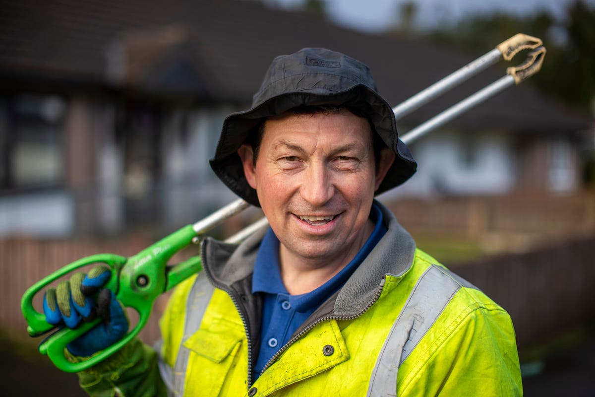 Stephen Burns, road sweeper for Mid and East Antrim Borough Council, pictured at work in Portglenone, County Antrim. BEM for services to the community in Portglenone (Liam McBurney/PA)