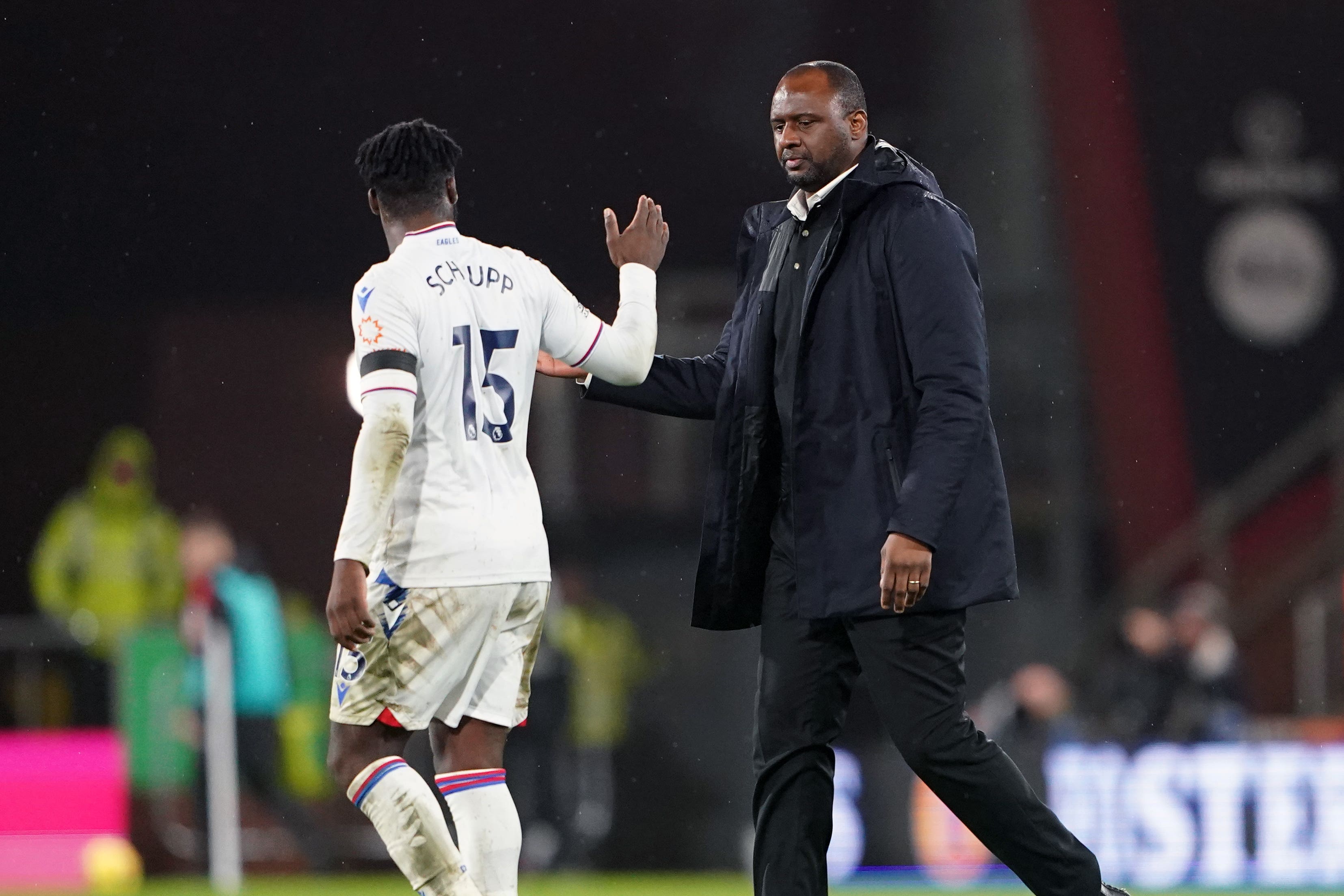 Patrick Vieira celebrates with Jeffrey Schlupp after Crystal Palace beat Bournemouth (Zac Goodwin/PA)