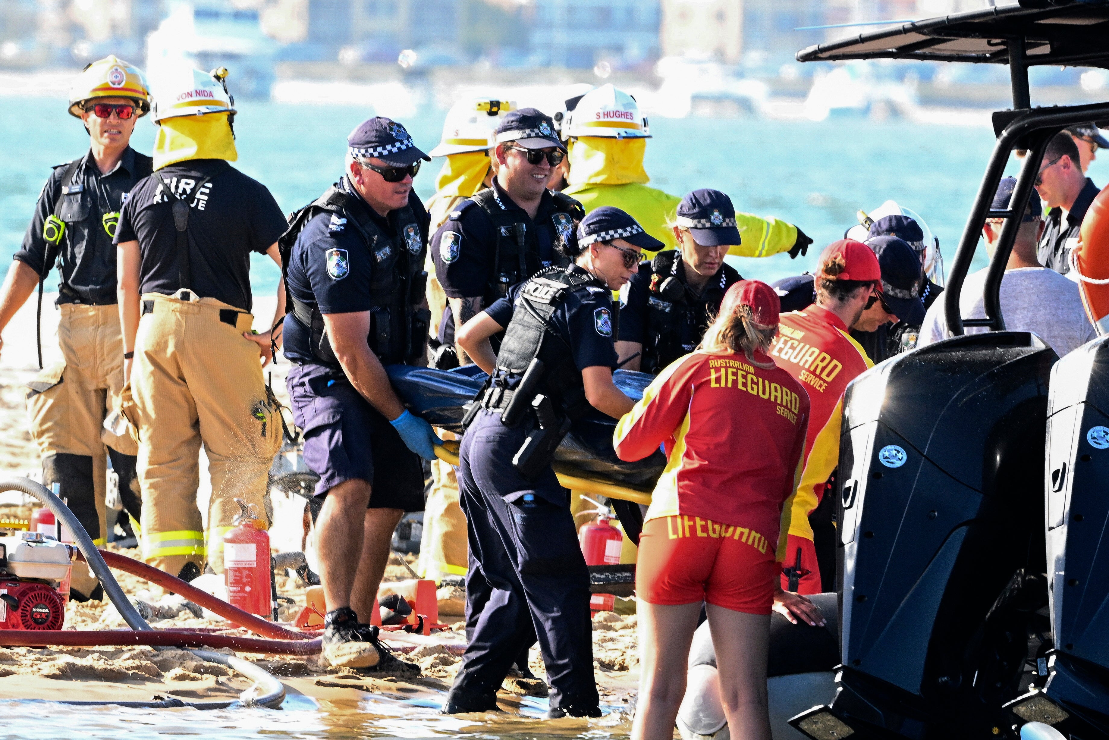 Emergency workers at the scene of the fatal crash