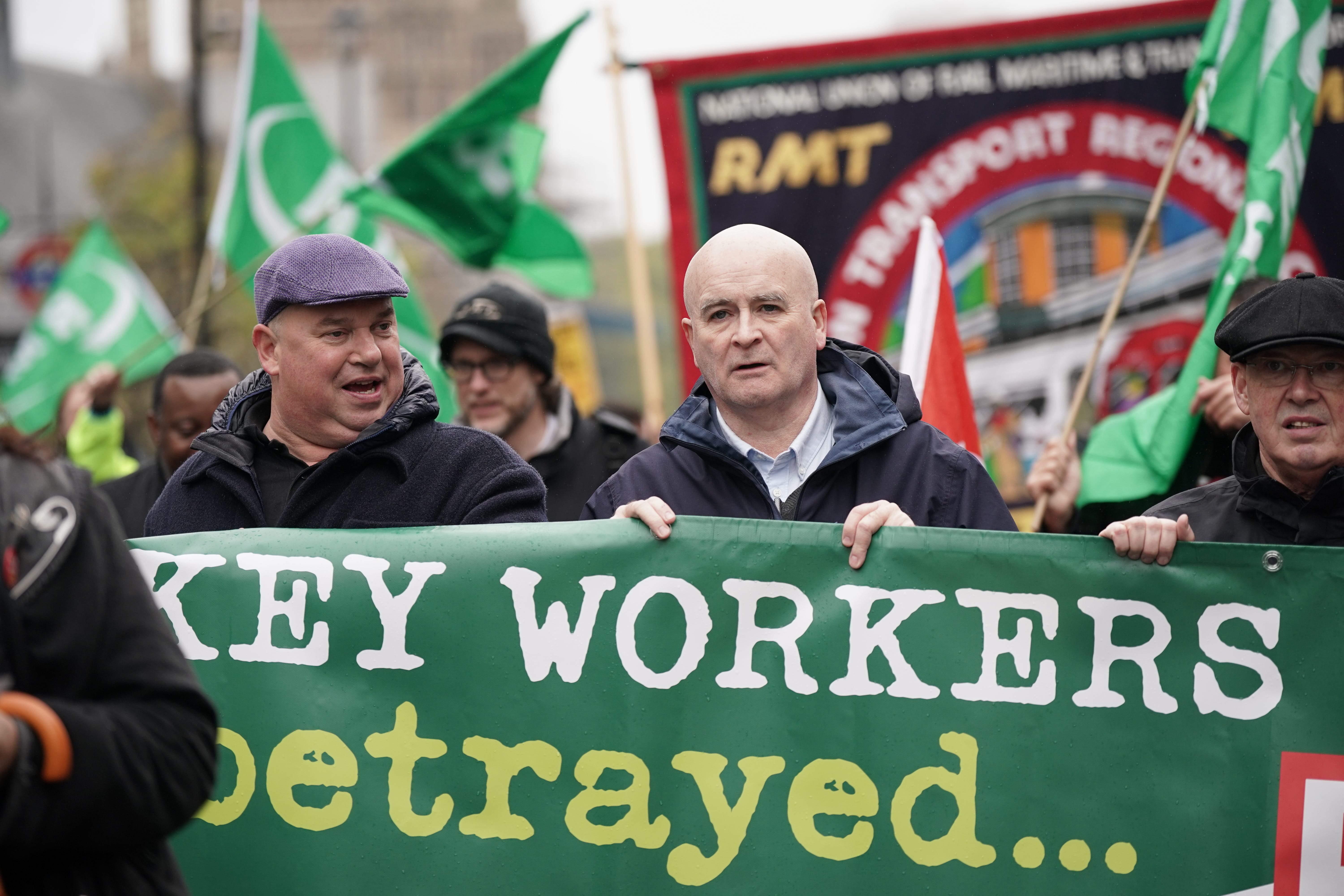 RMT general secretary Mick Lynch (centre) at a rally in London (Yui Mok/PA)