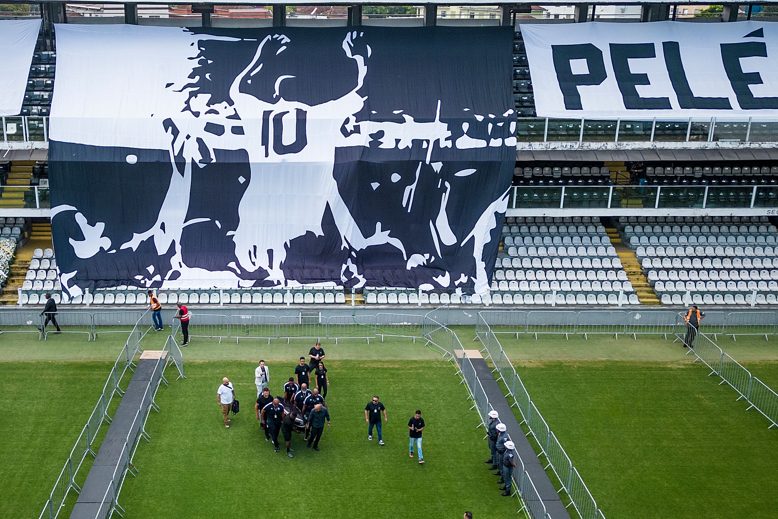 Pelé funeral – live: Brazil legend and three-time World Cup winner to lie in state as coffin arrives at Santos