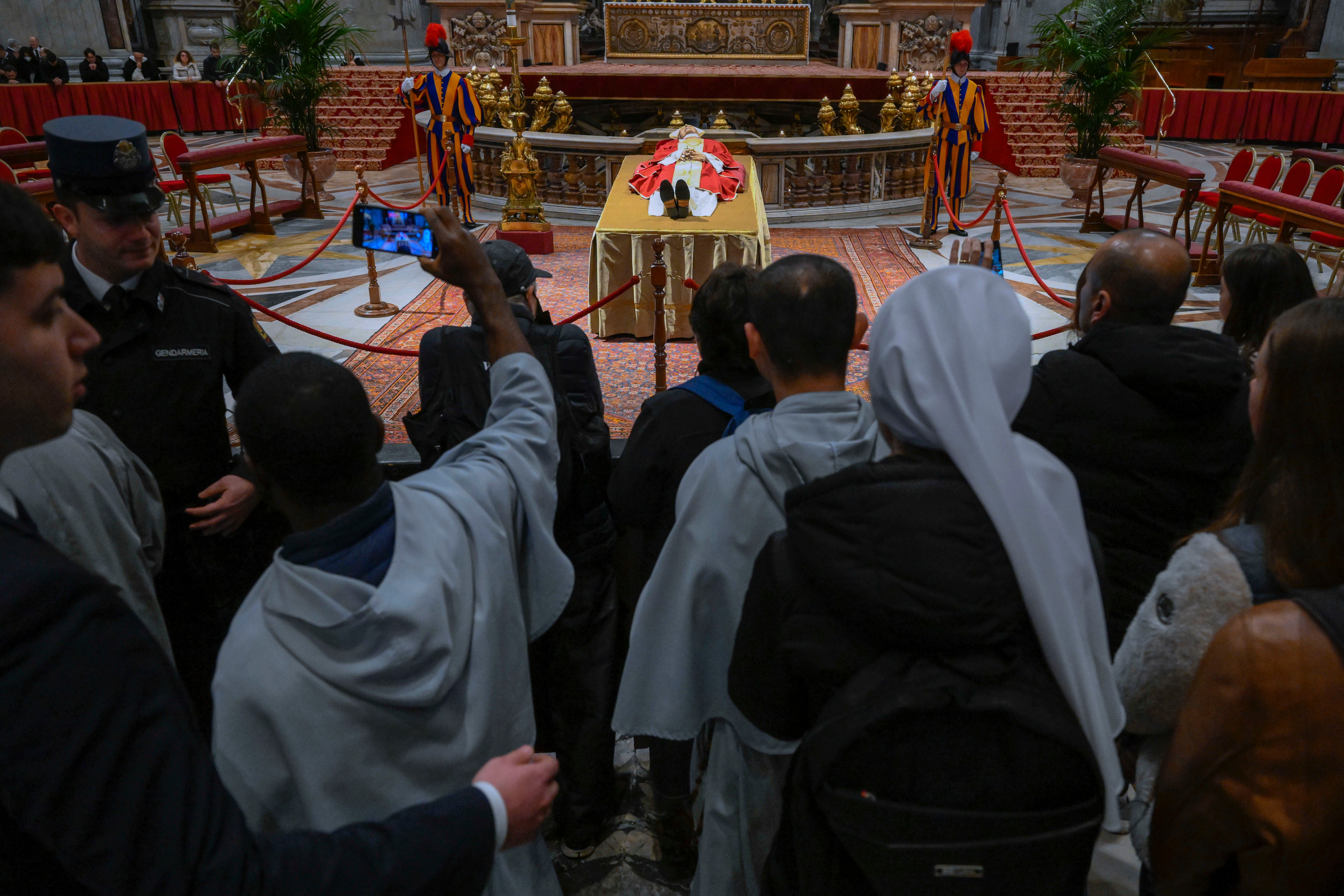 Thousands of people came to pay their respects to the former pontiff