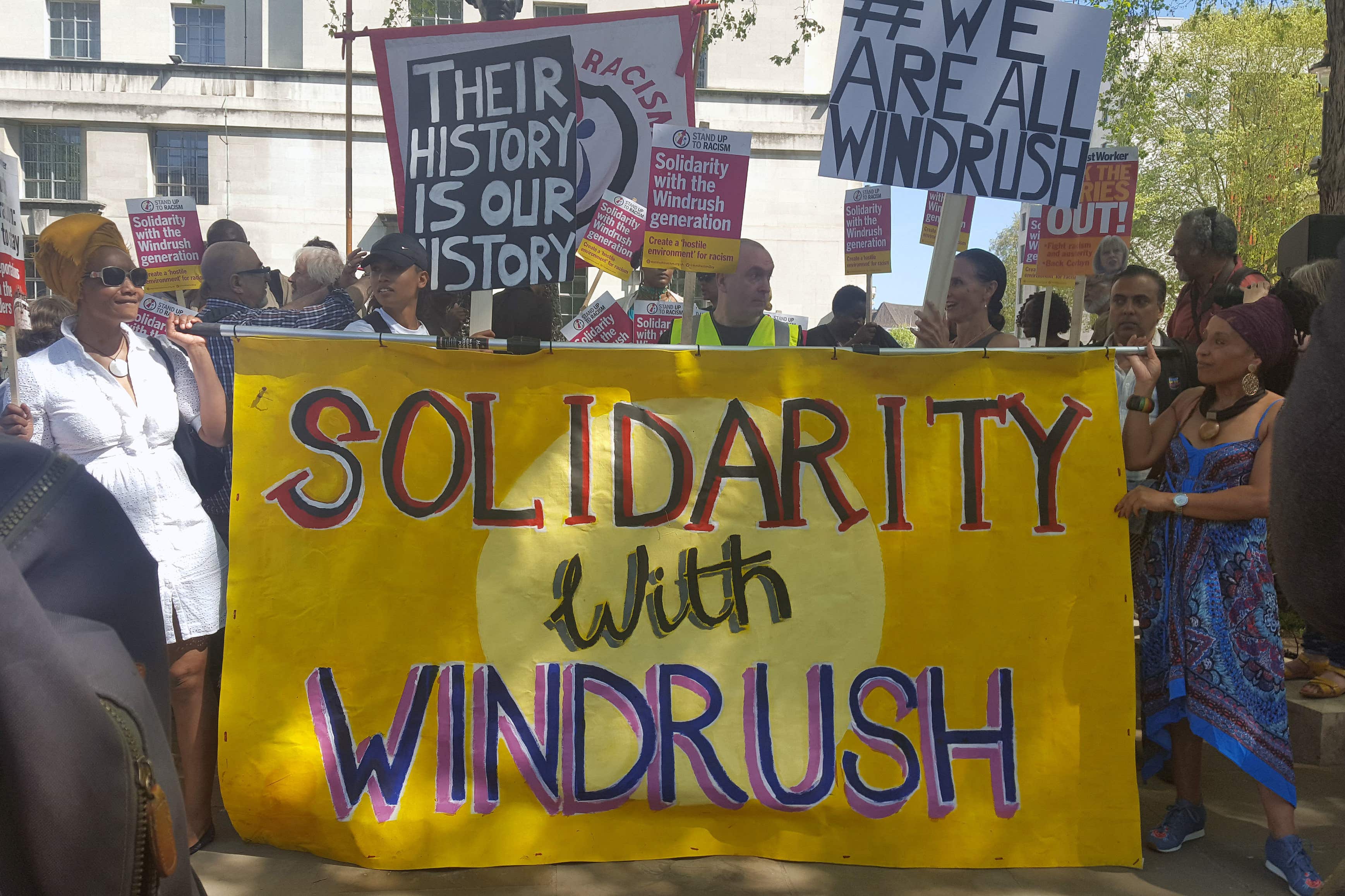 Members of Campaign group Stand Up To Racism during a demonstration (Catherine Wylie/PA)