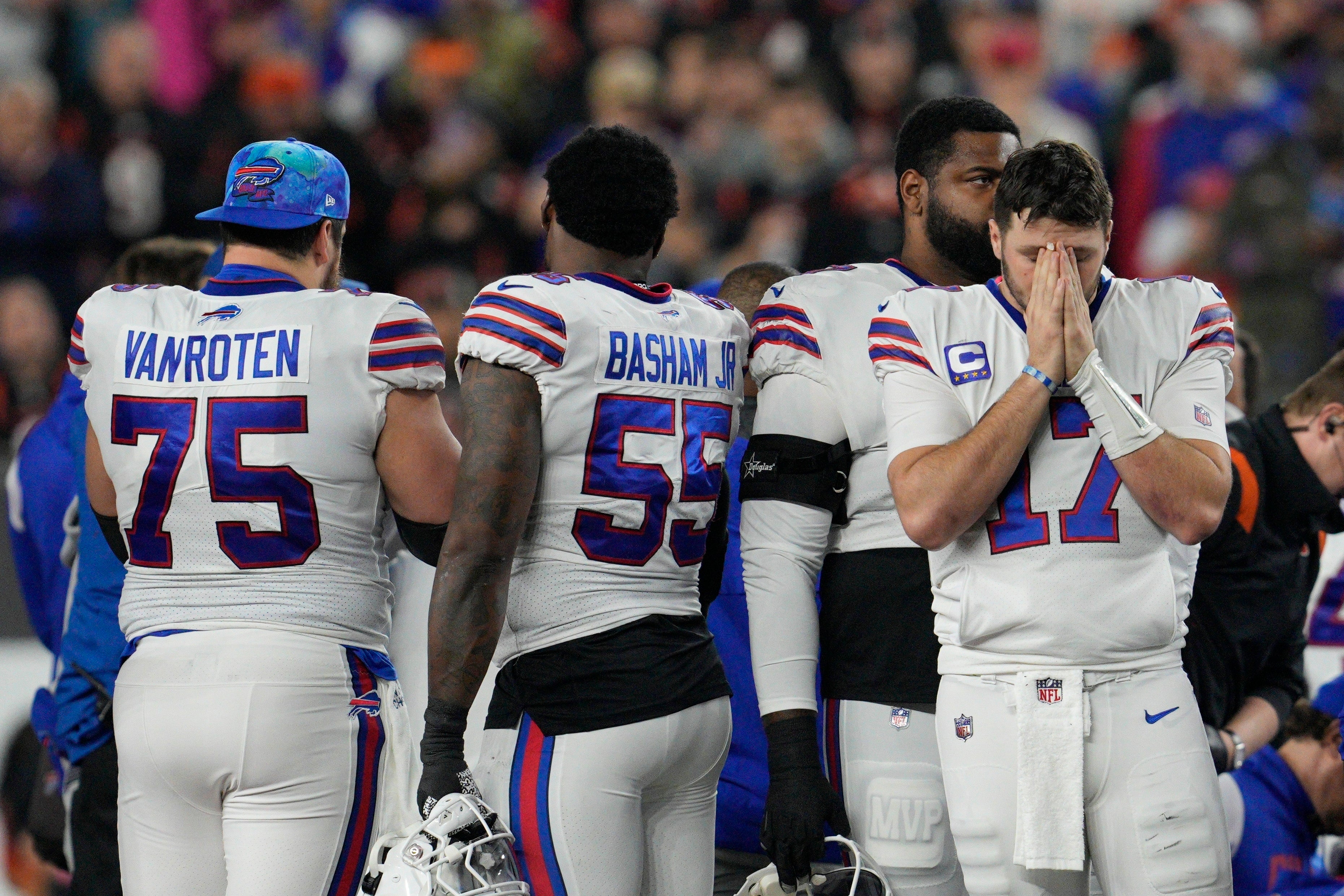 Buffalo quarterback Josh Allen (right) supported his teammate