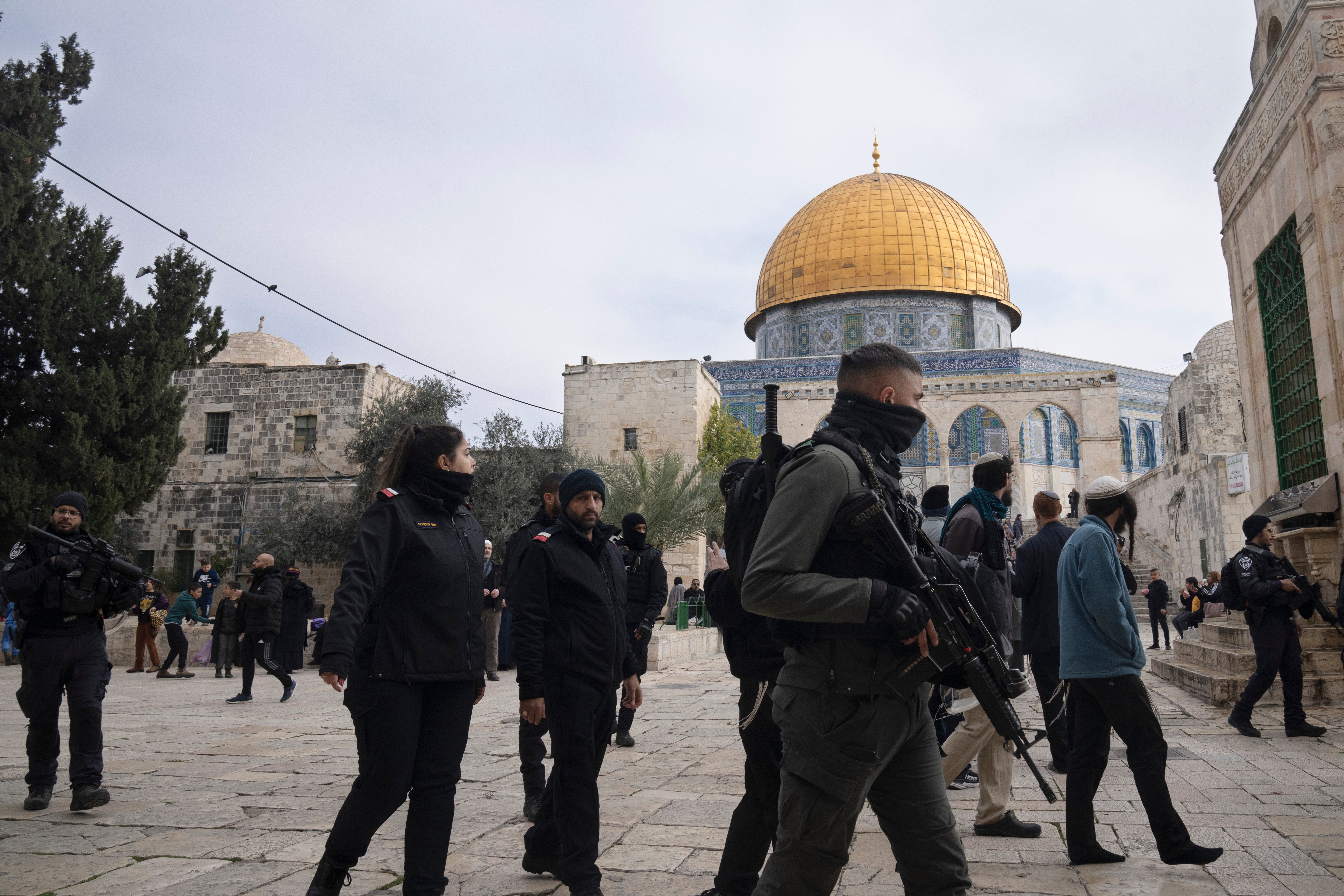 Israeli police escort Jewish visitors to the al-Aqsa mosque compound on Tuesday