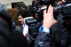 Sam Bankman-Fried fights through media scrum for first US court appearance