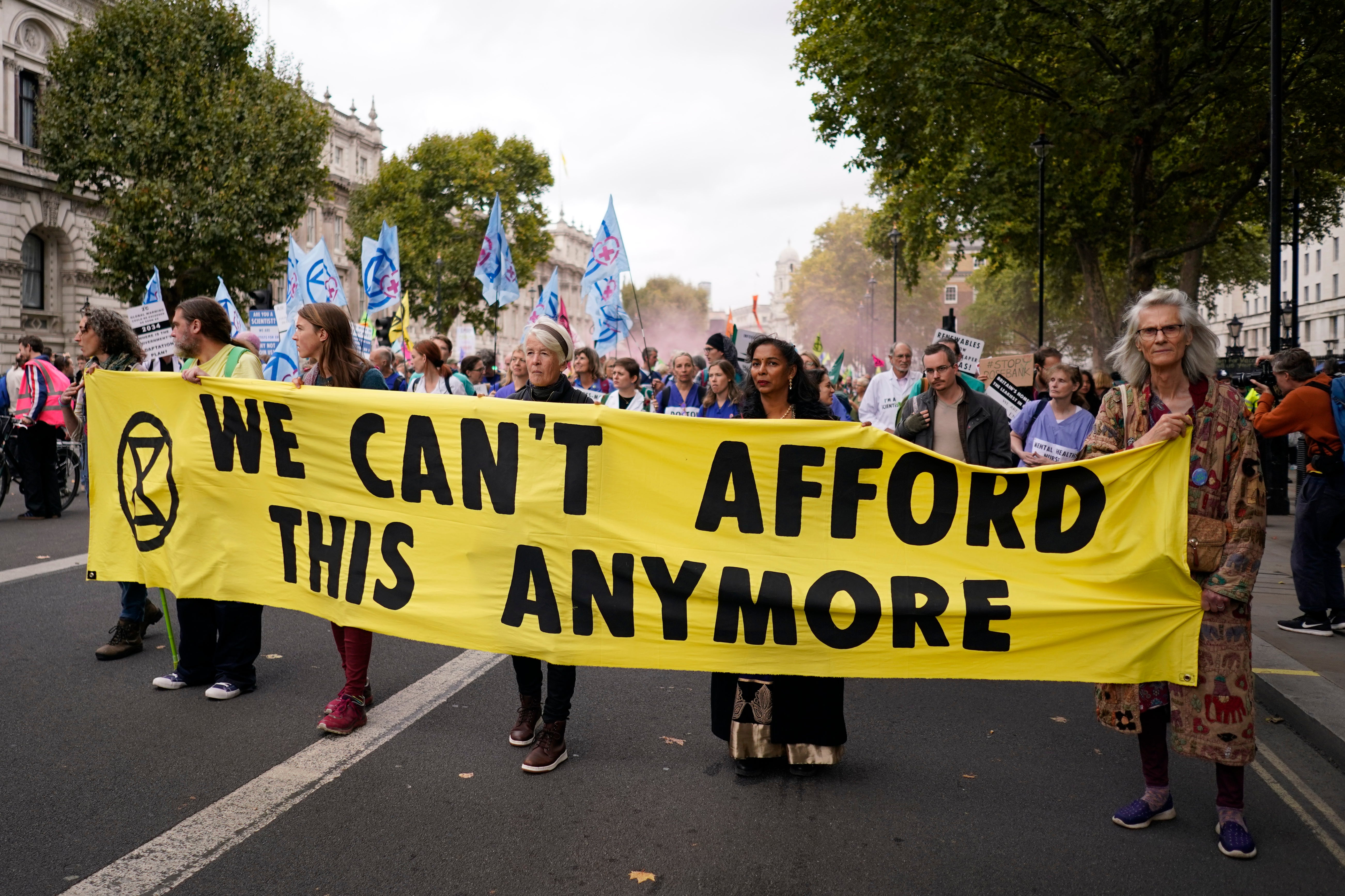 XR protesters march along Whitehall near Downing Street last year