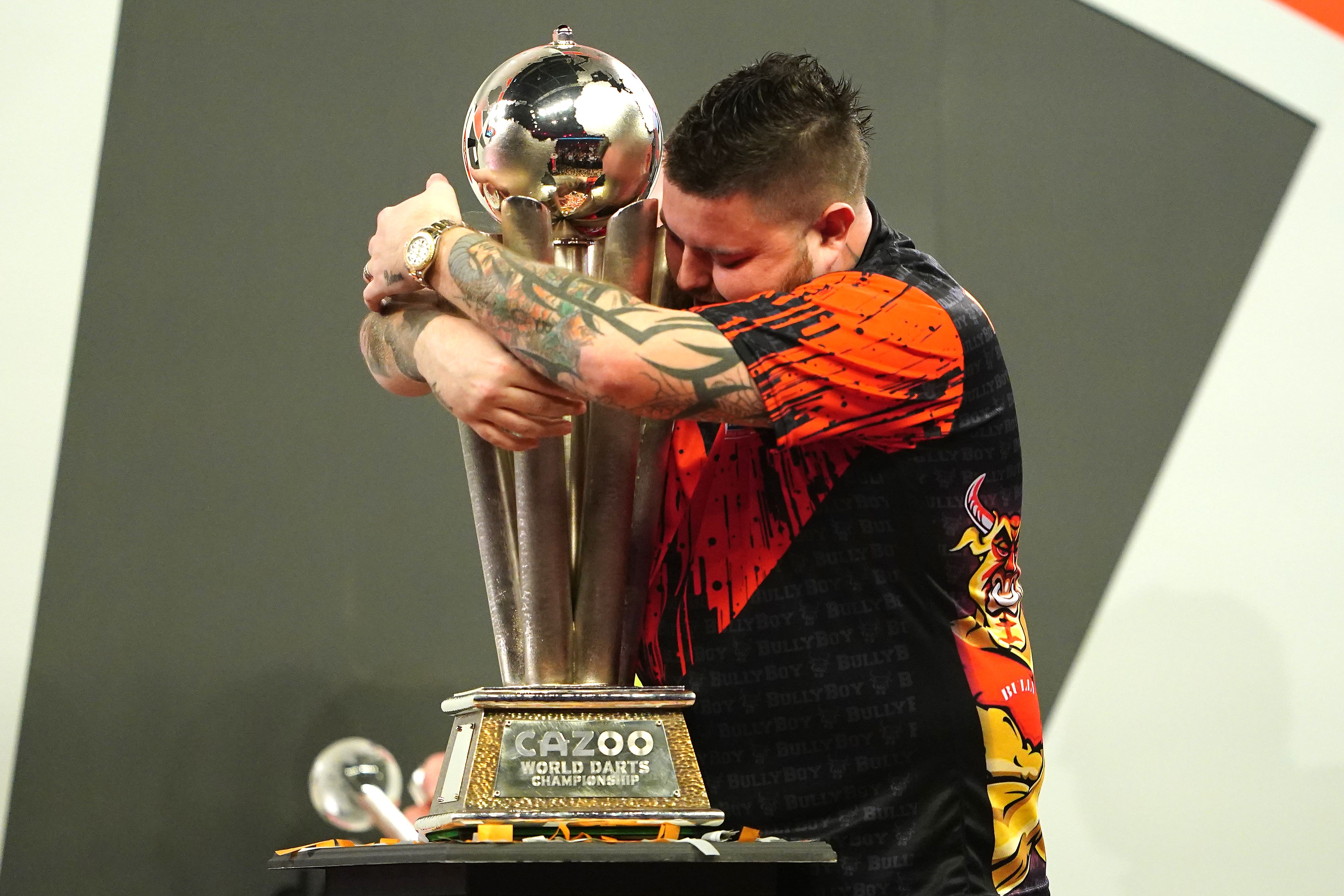 Michael Smith won his first World Championship title (Zac Goodwin/PA)