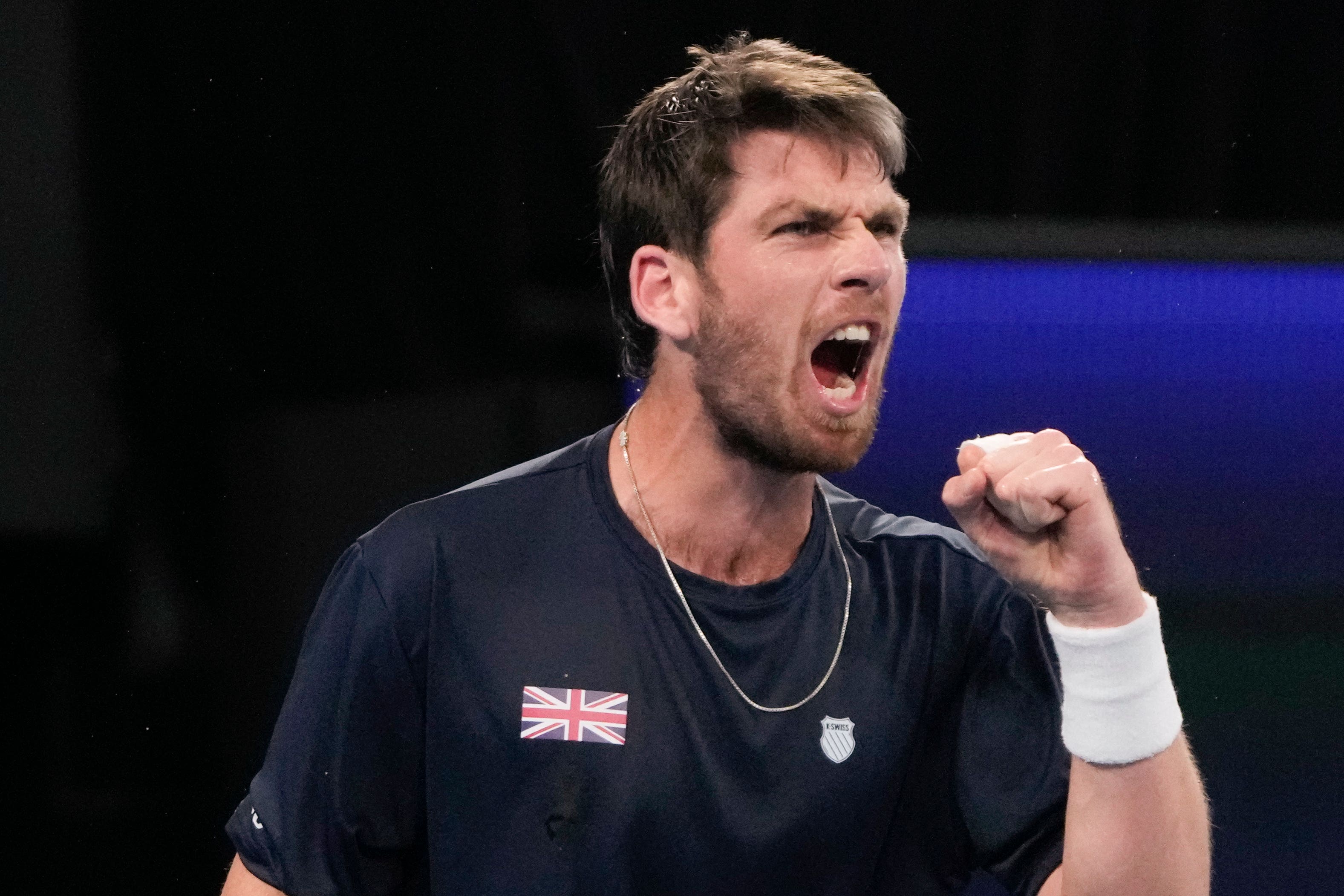 Cameron Norrie celebrates after beating Taylor Fritz 6-4 5-7 6-4 (Mark Baker/AP).