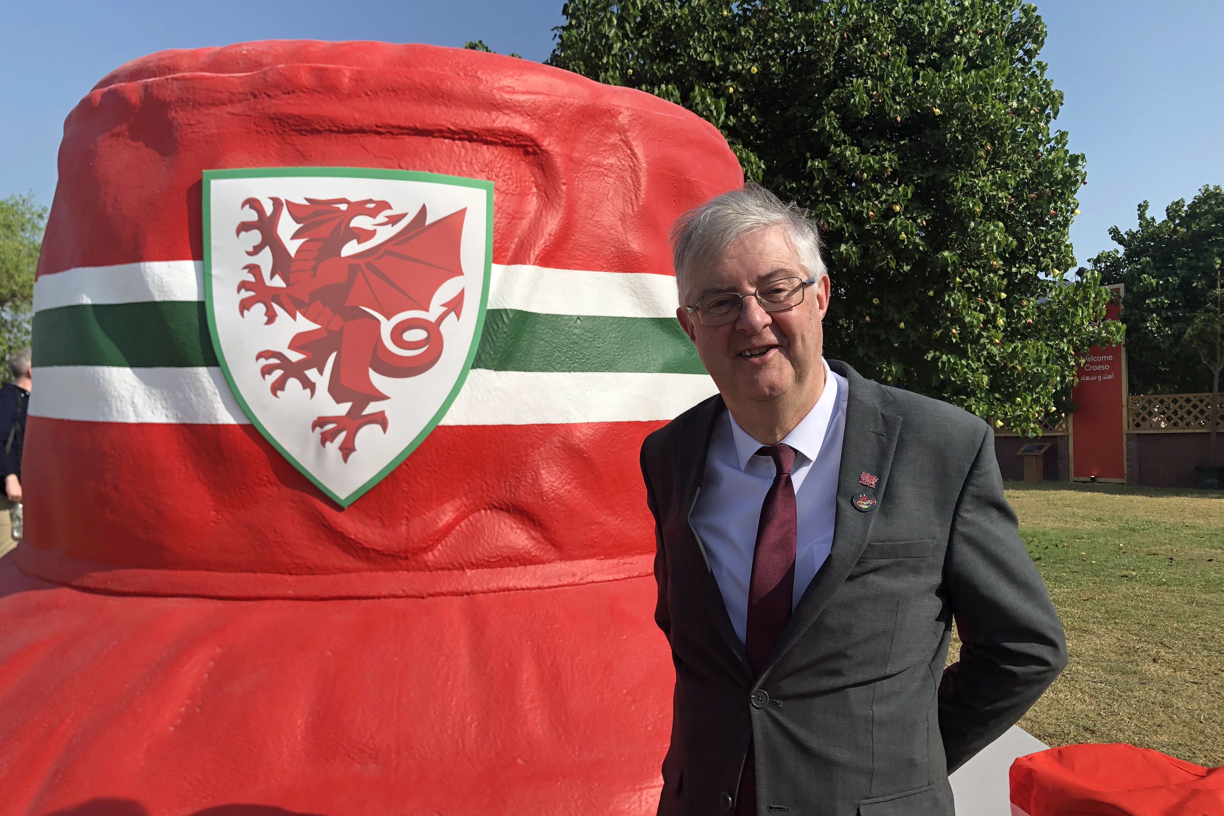 Wales First Minister Mark Drakeford in front of the giant bucket hat on the Corniche in Doha, Qatar during the FIFA World Cup 2022 (Bronwen Weatherby/PA)