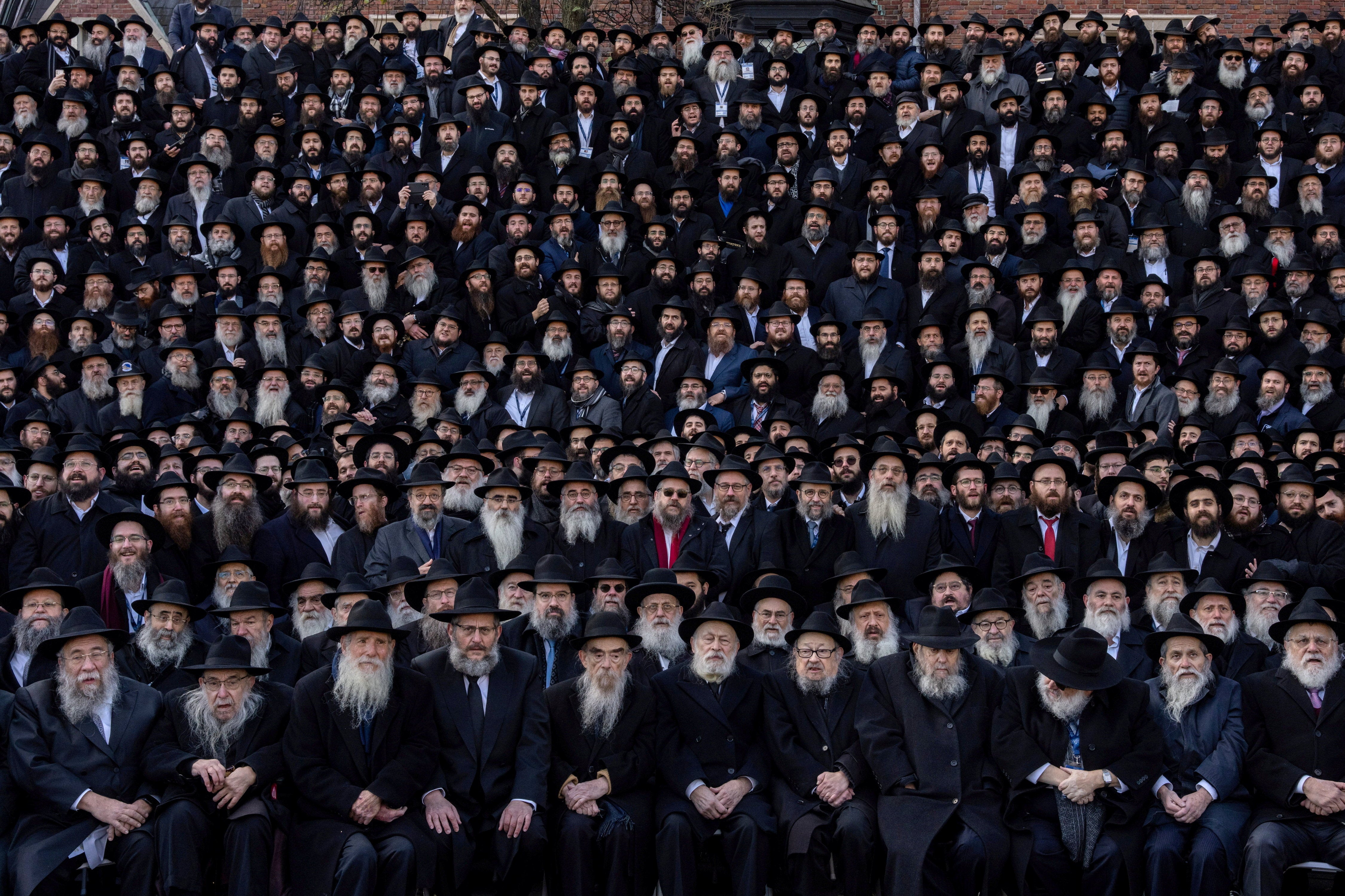 Thousands of Chabad-Lubavitch rabbis pose for a ‘class picture’ outside of Chabad World Headquarters in New York