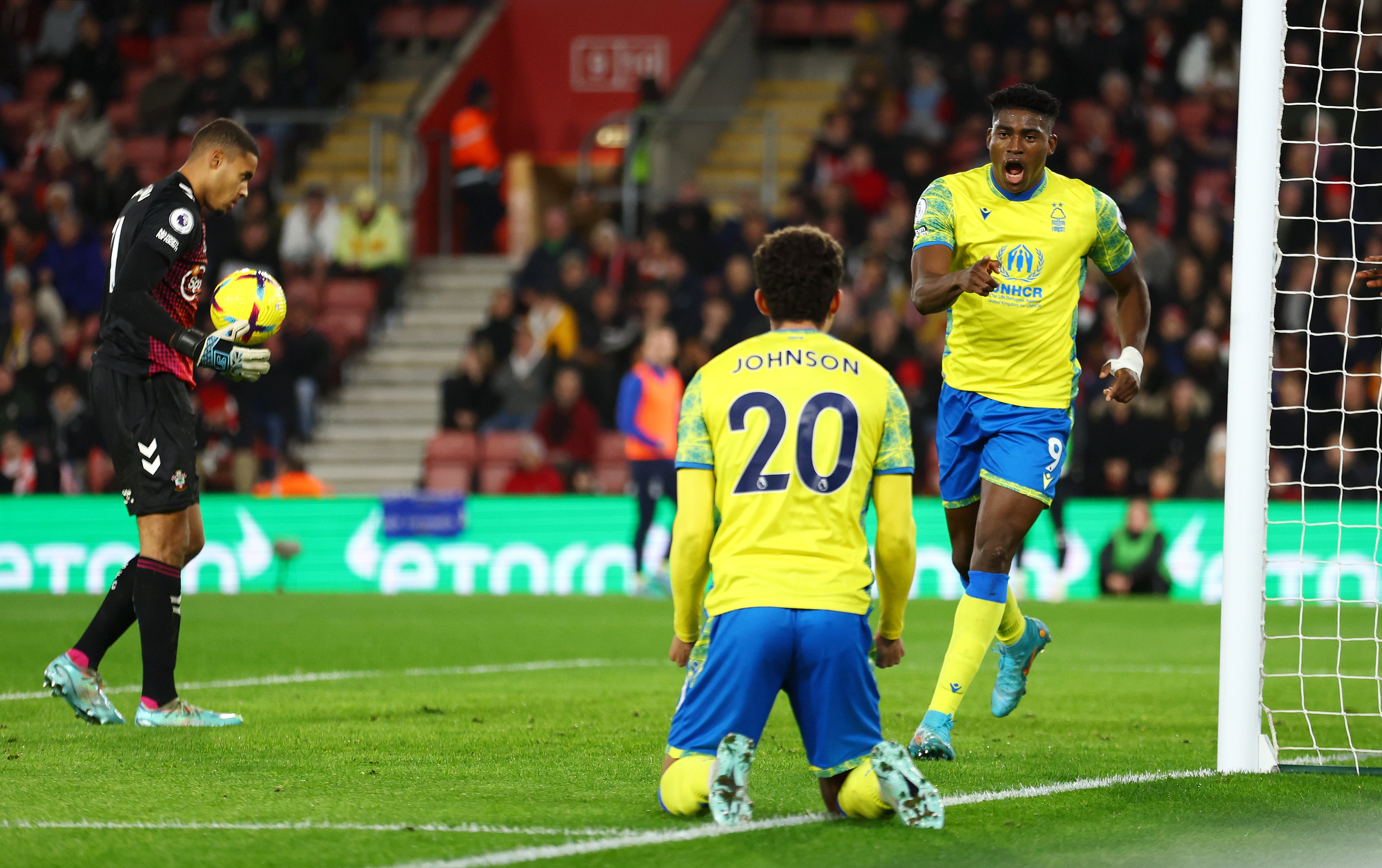 Taiwo Awoniyi celebrates with Forest teammate Brennan Johnson