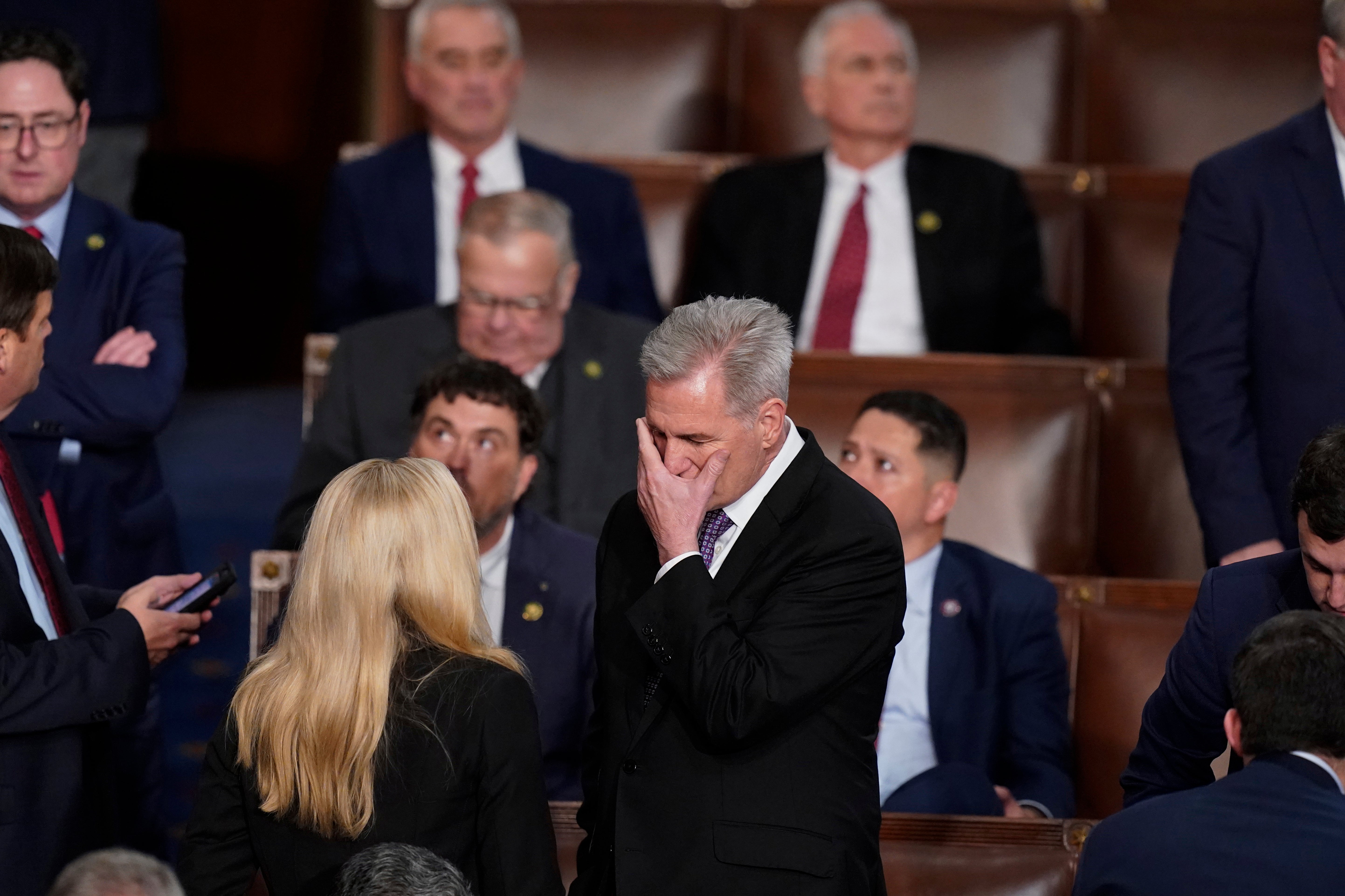 Kevin McCarthy speaking with Marjorie Taylor Greene as he lobbied to become Speaker