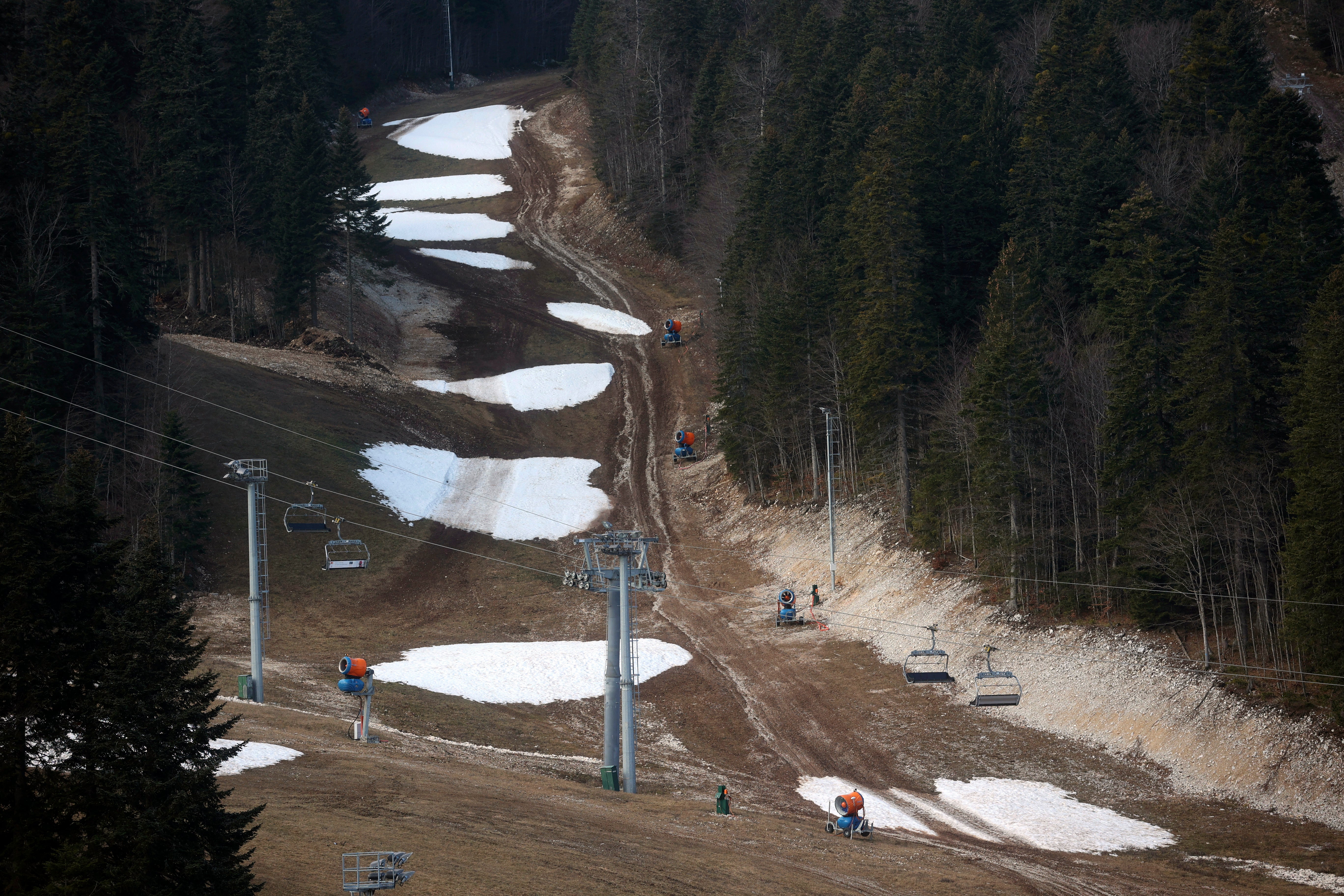 A ski track with only a few patches of snow on Bjelasnica mountain near Sarajevo, Bosnia