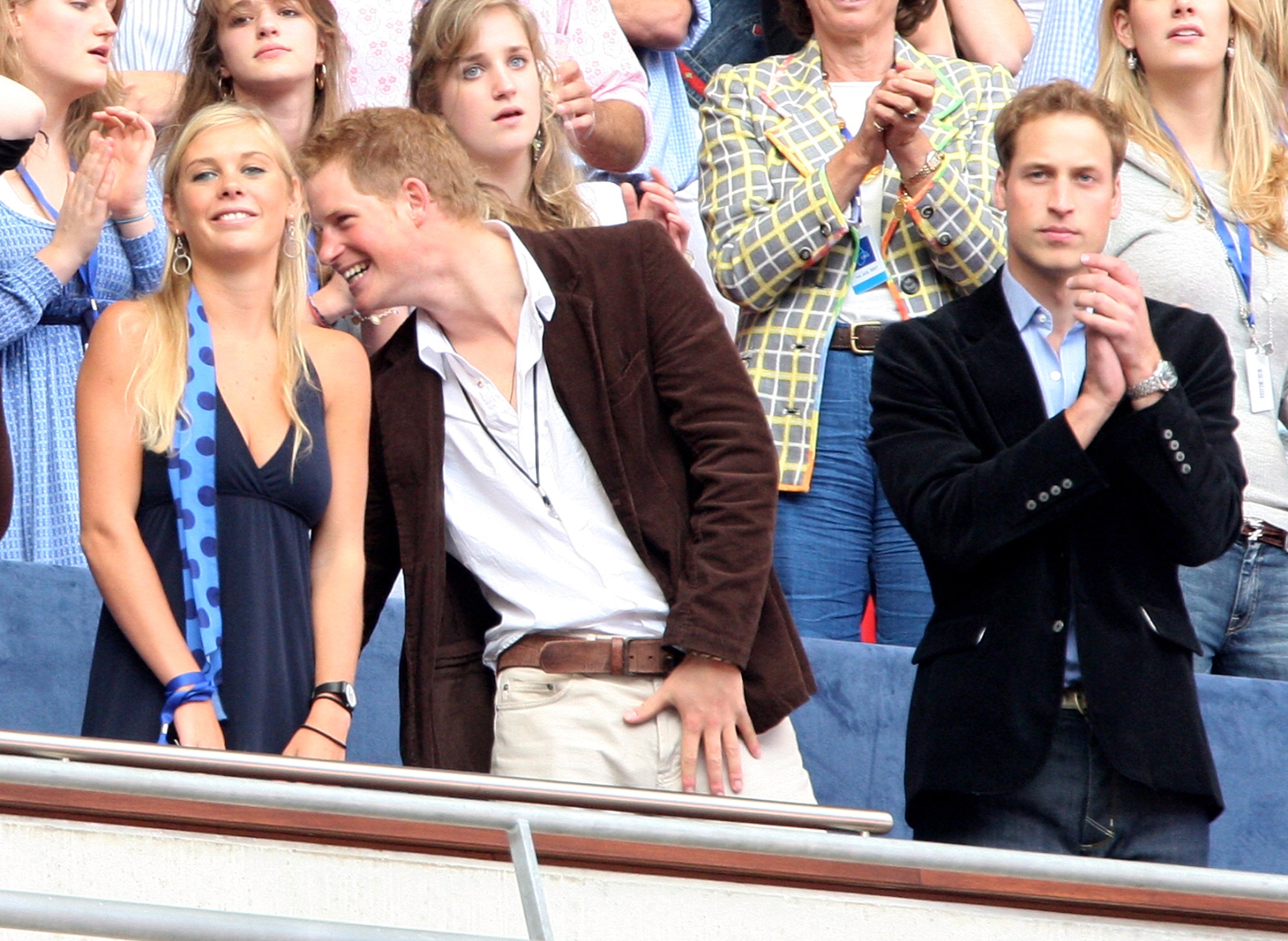 Prince Harry, Chelsy Davy and Prince William watch the Concert for Diana at Wembley Stadium on 1 July, 2007