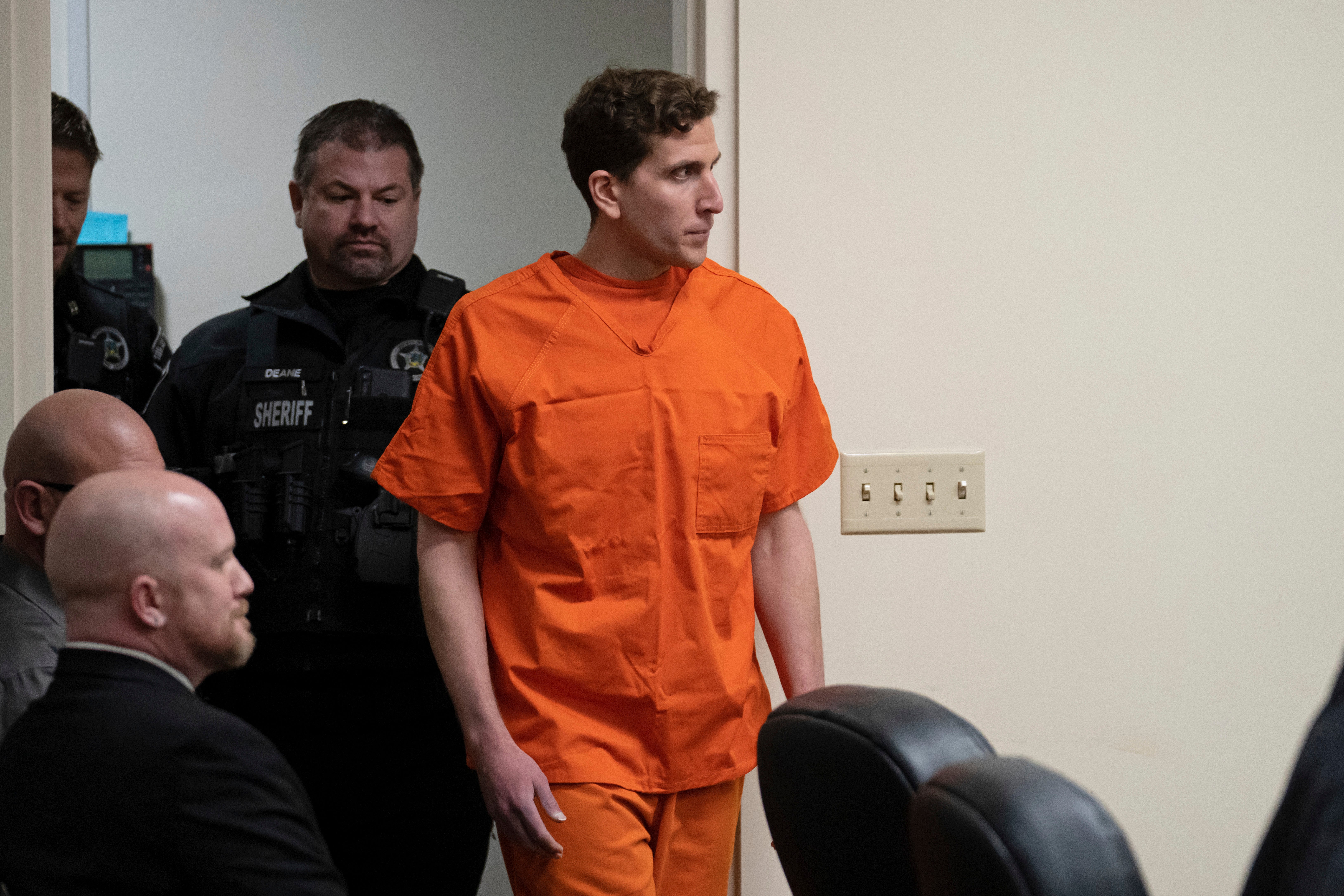 Bryan Kohberger, right, who is accused of killing four University of Idaho students in November 2022, is escorted into a courtroom for a hearing in Latah County District Court, Thursday, Jan. 5, 2023, in Moscow, Idaho