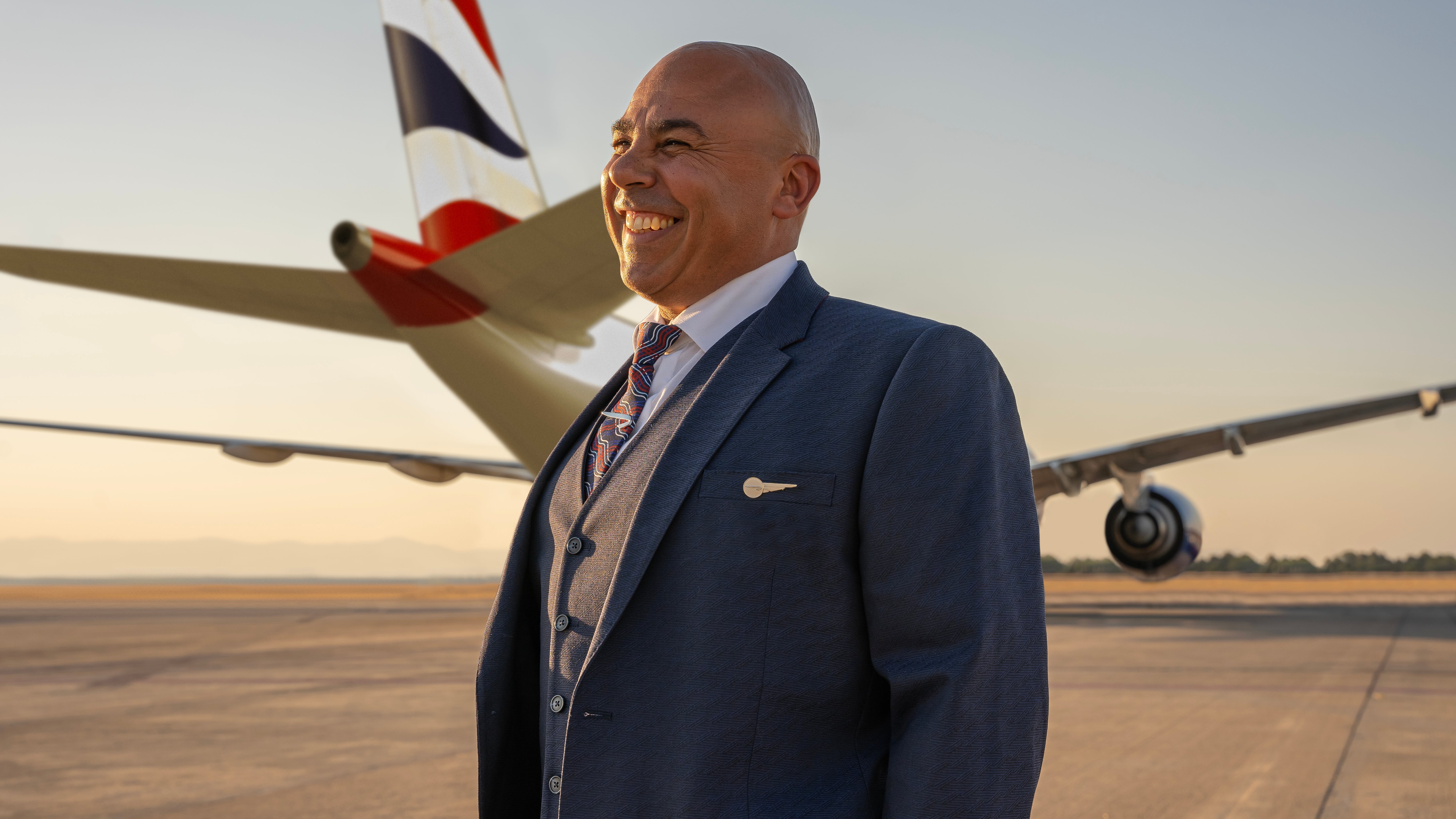 Male cabin crew will wear a three-piece suit