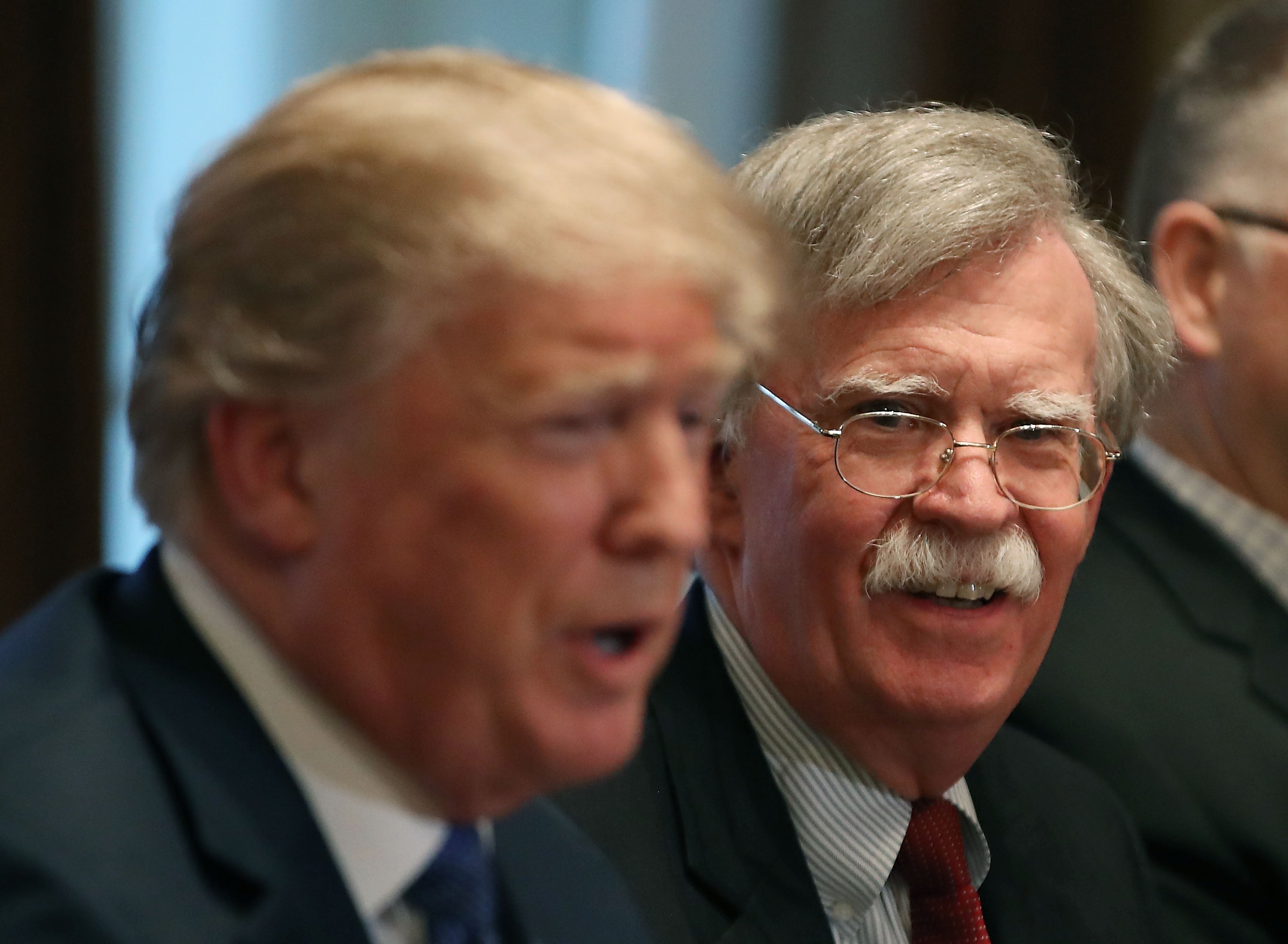 John Bolton, left, with Donald Trump in the White House