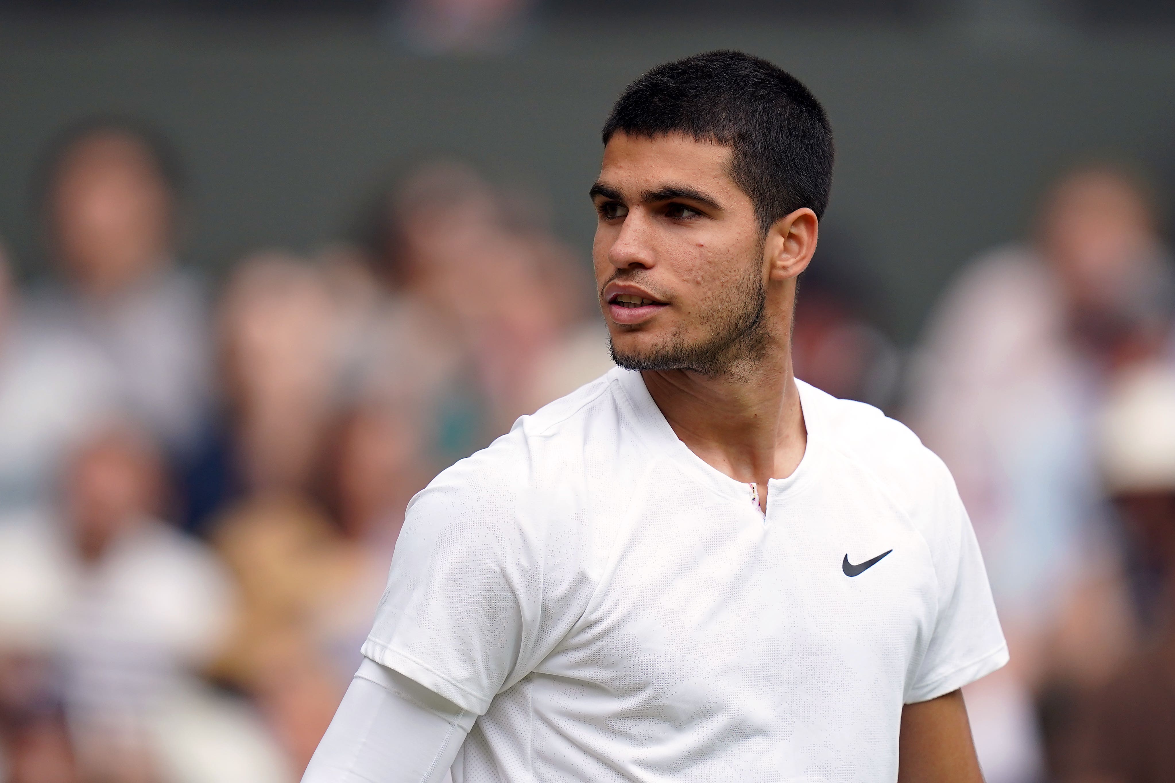 Carlos Alcaraz is out of the Australian Open (Adam Davy/PA)