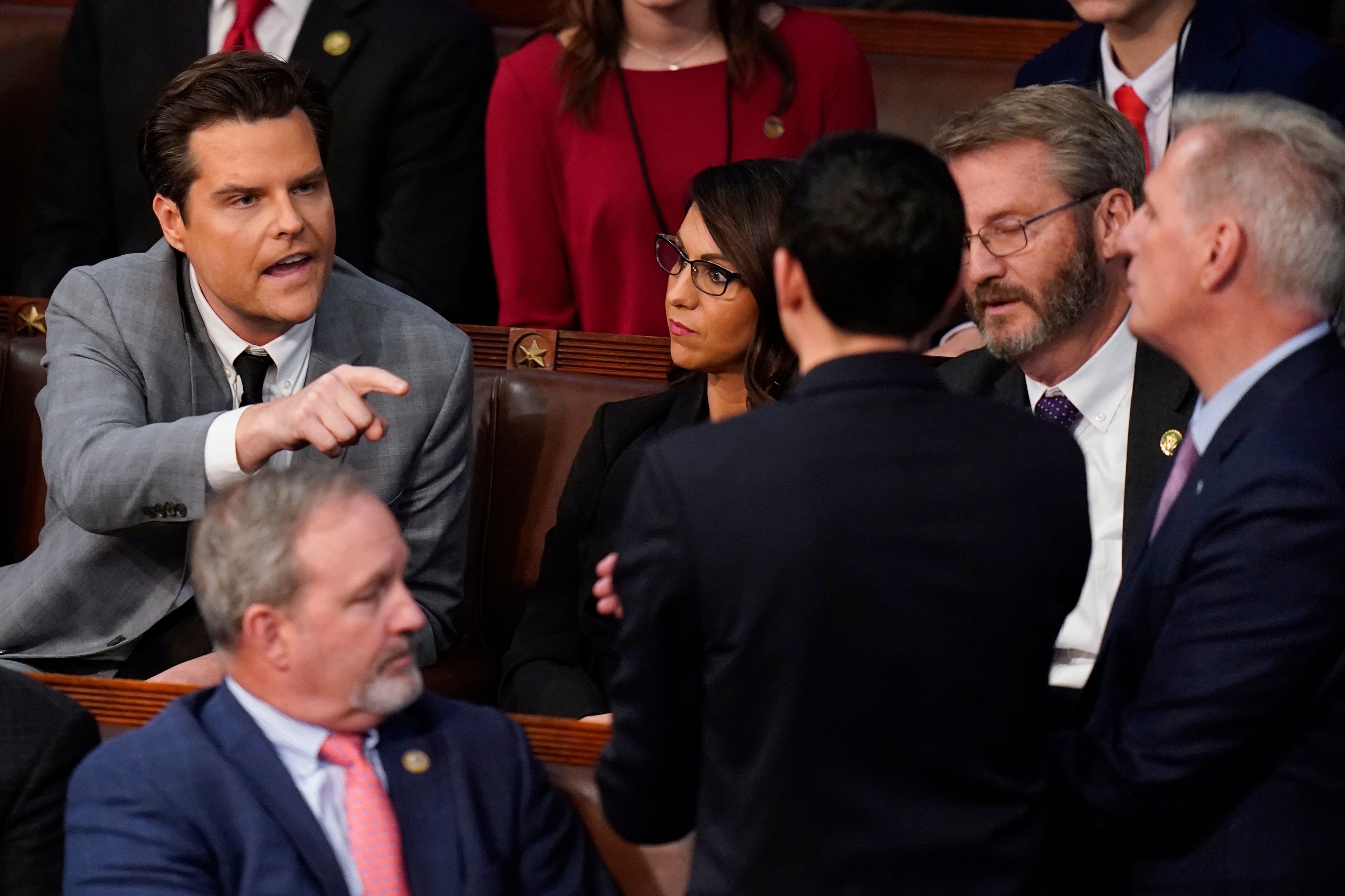 Representative Matt Gaetz of Florida, left, talks to Kevin McCarthy