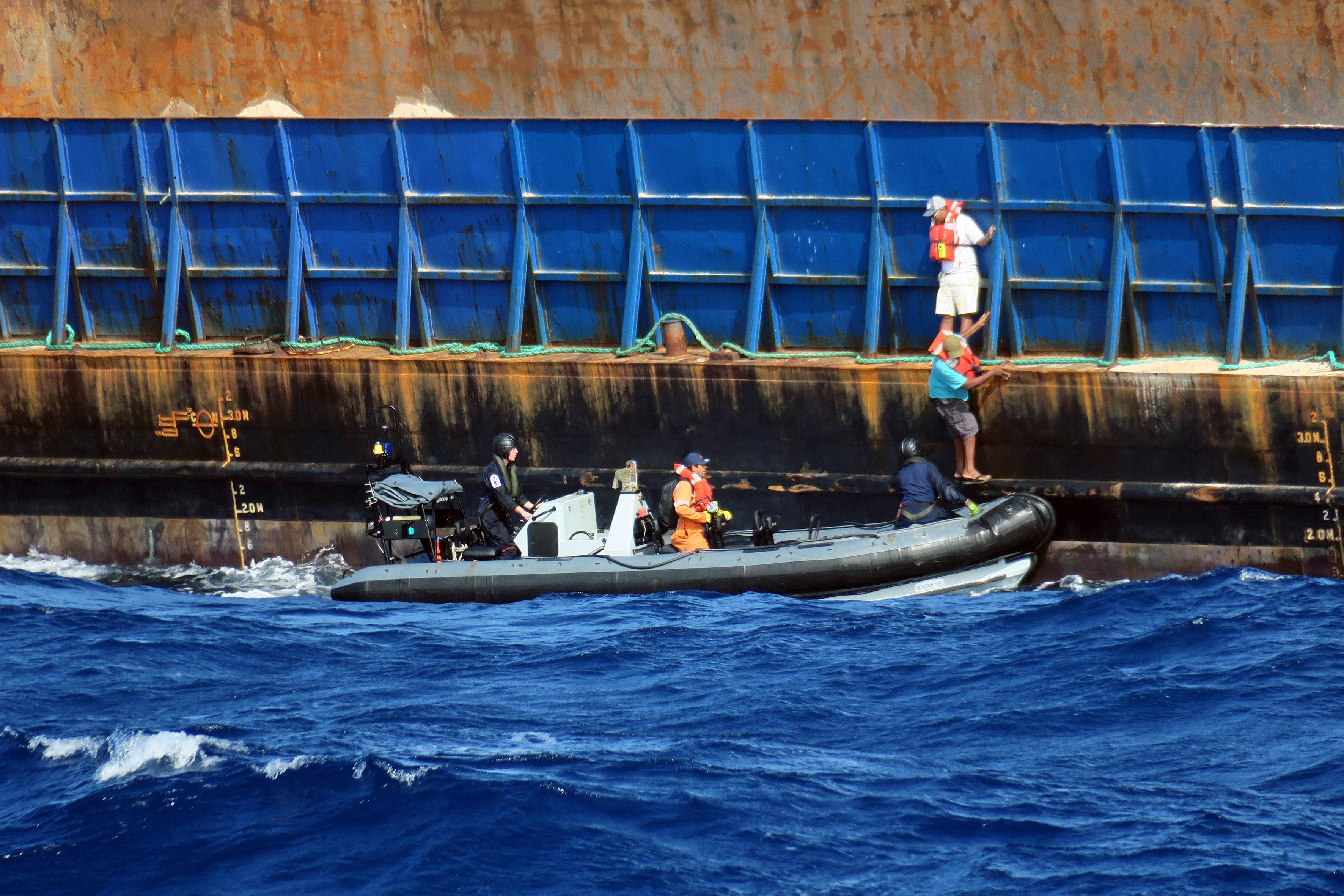 Patrol ship HMS Medway’s sea boat rescuing the crew (Able Seaman Mitchell ‘Jack’ Macguire/Royal Navy/PA)