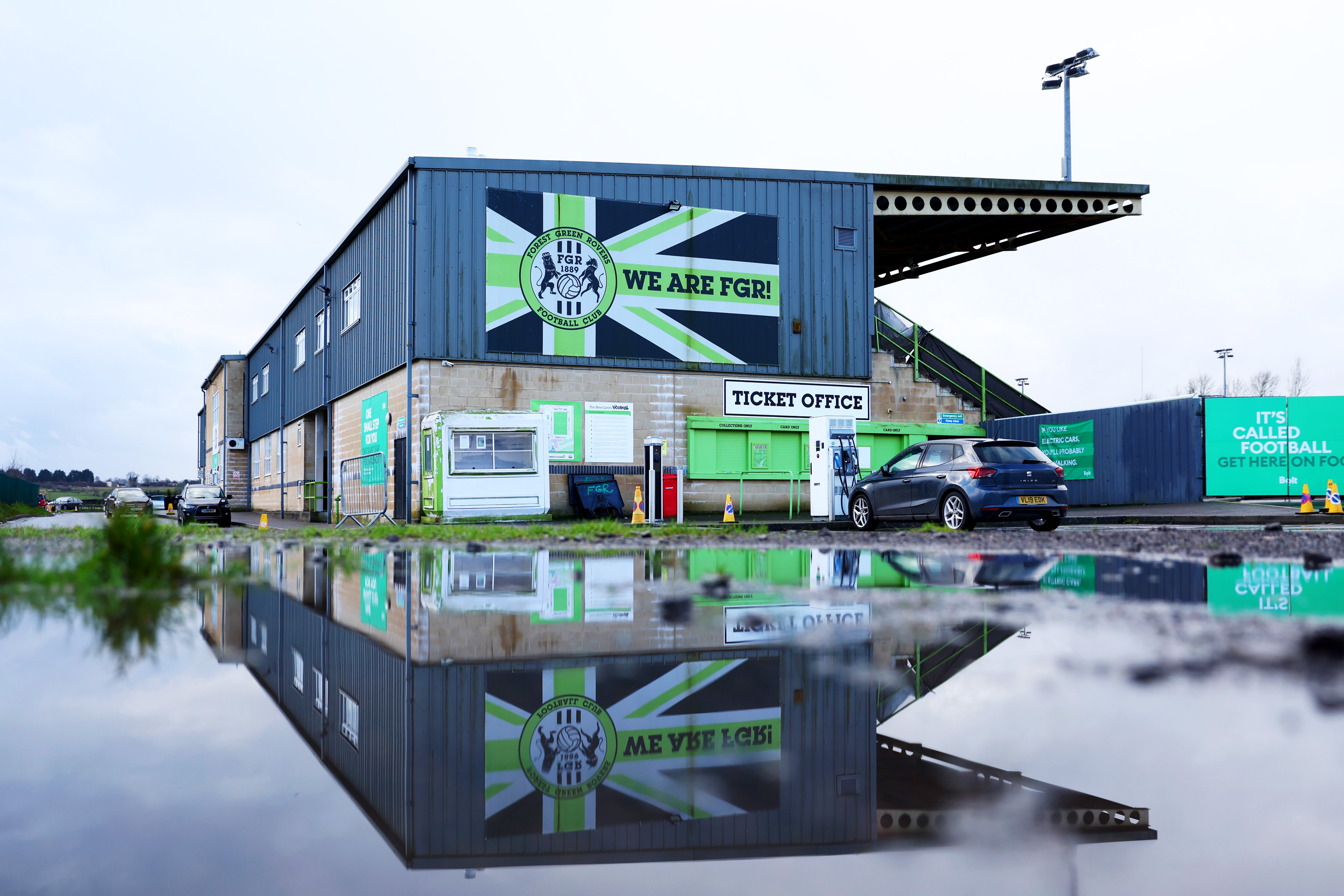 Water surrounding the stands at Forest Green Rovers