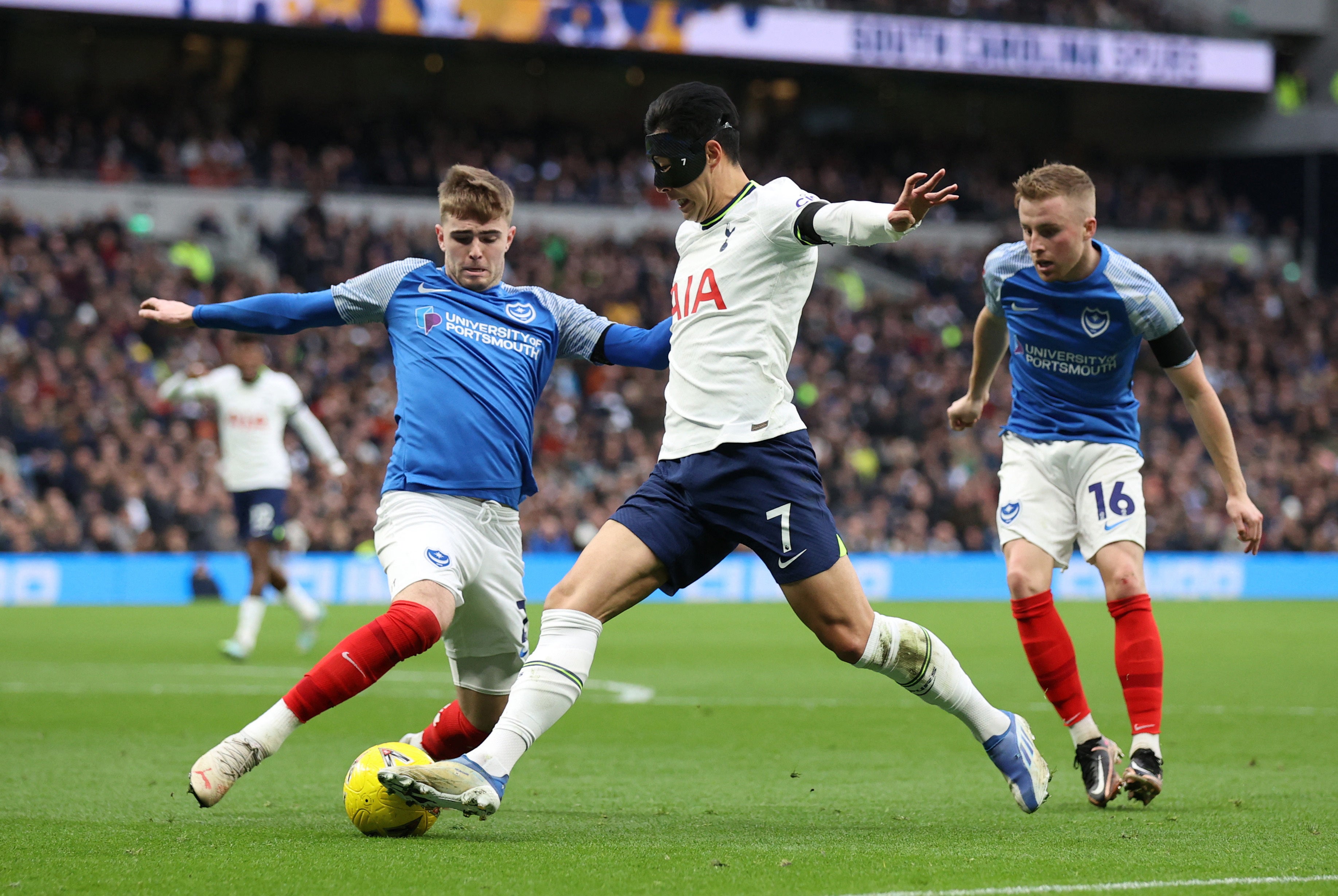 Son Heung-min dribbles at the Portsmouth defence