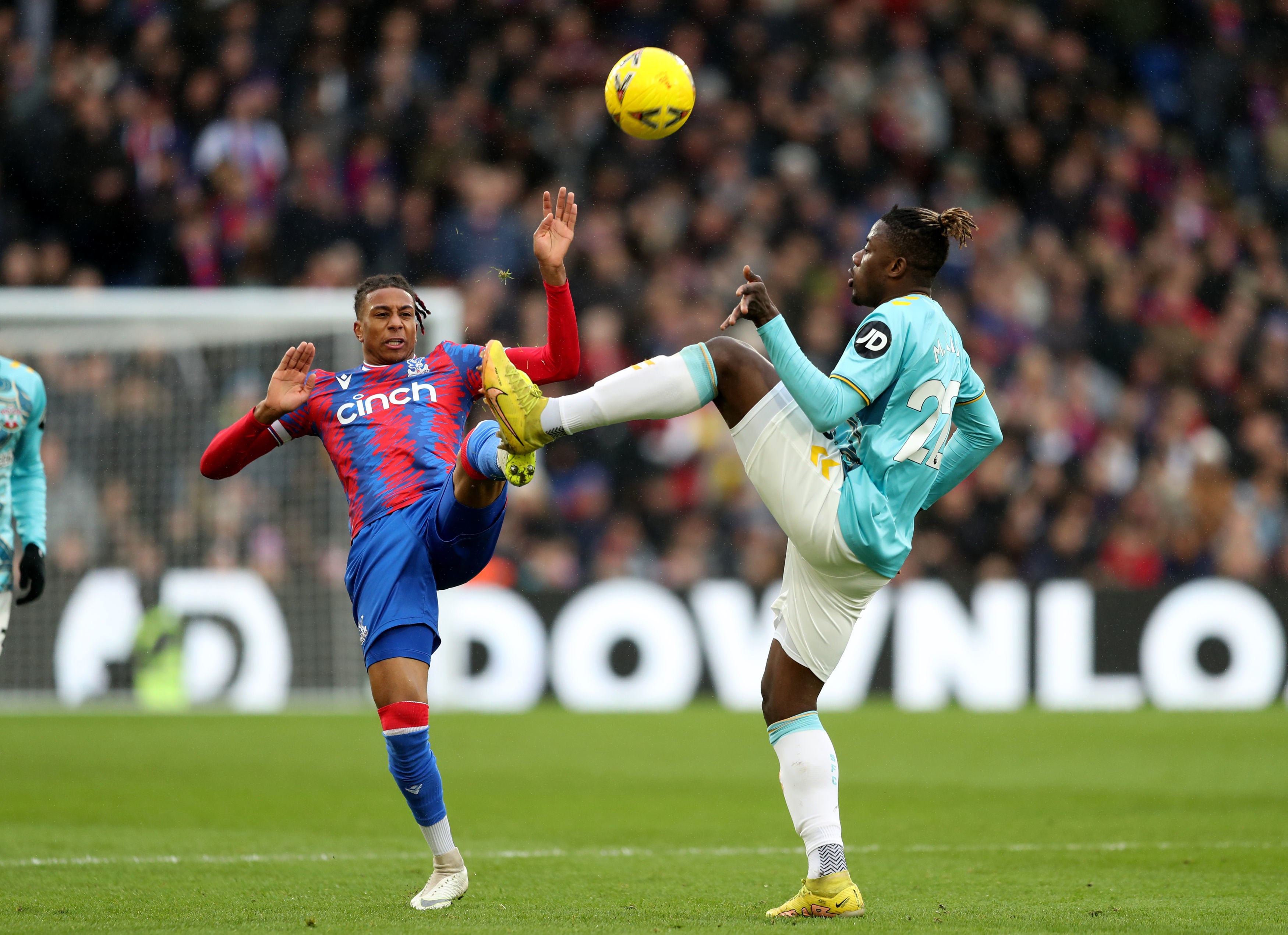 Crystal Palace's Michael Olise (left) and Southampton's Mohammed Salisu