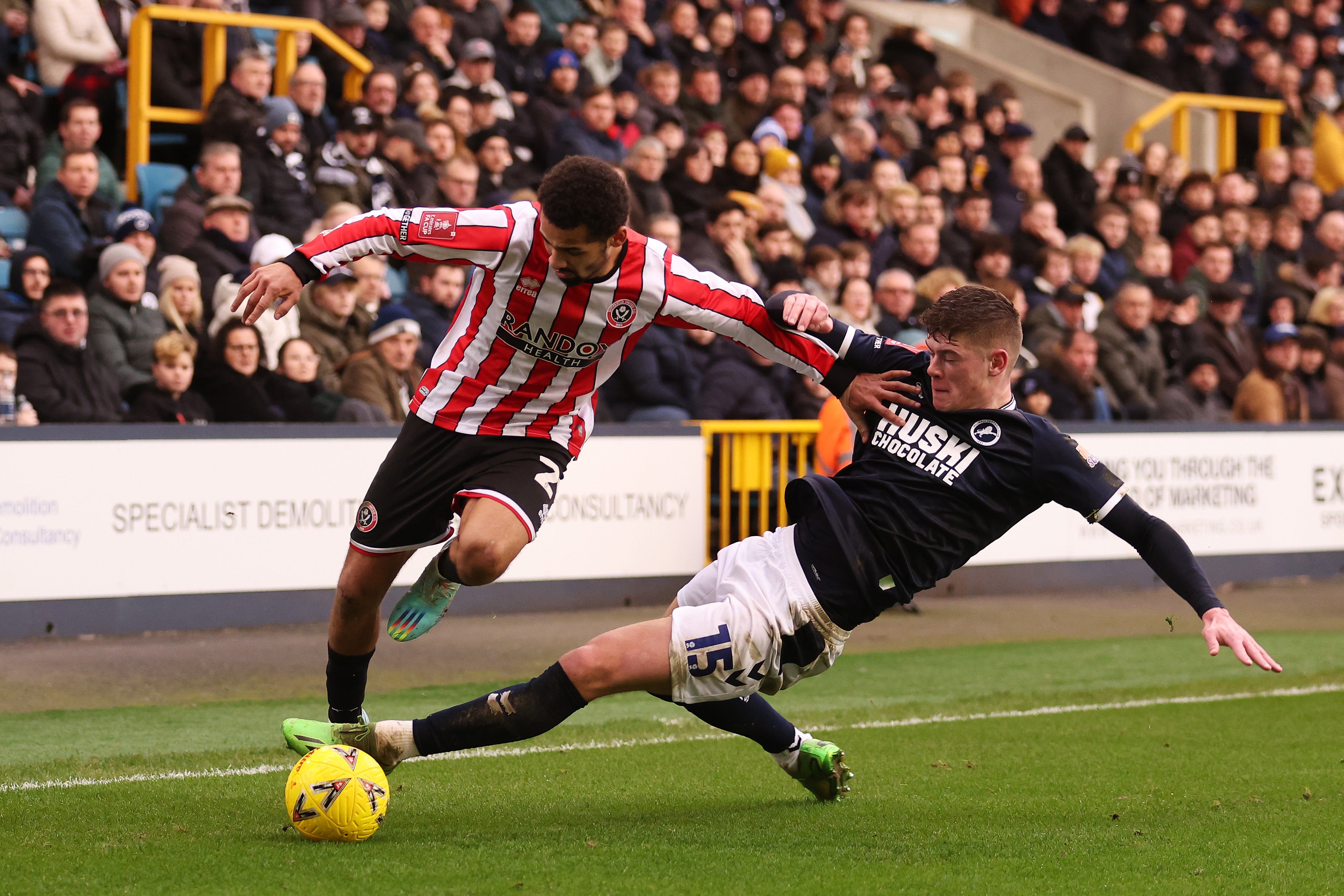 Iliman Ndiaye of Sheffield United is challenged by Charlie Cresswell of Millwall