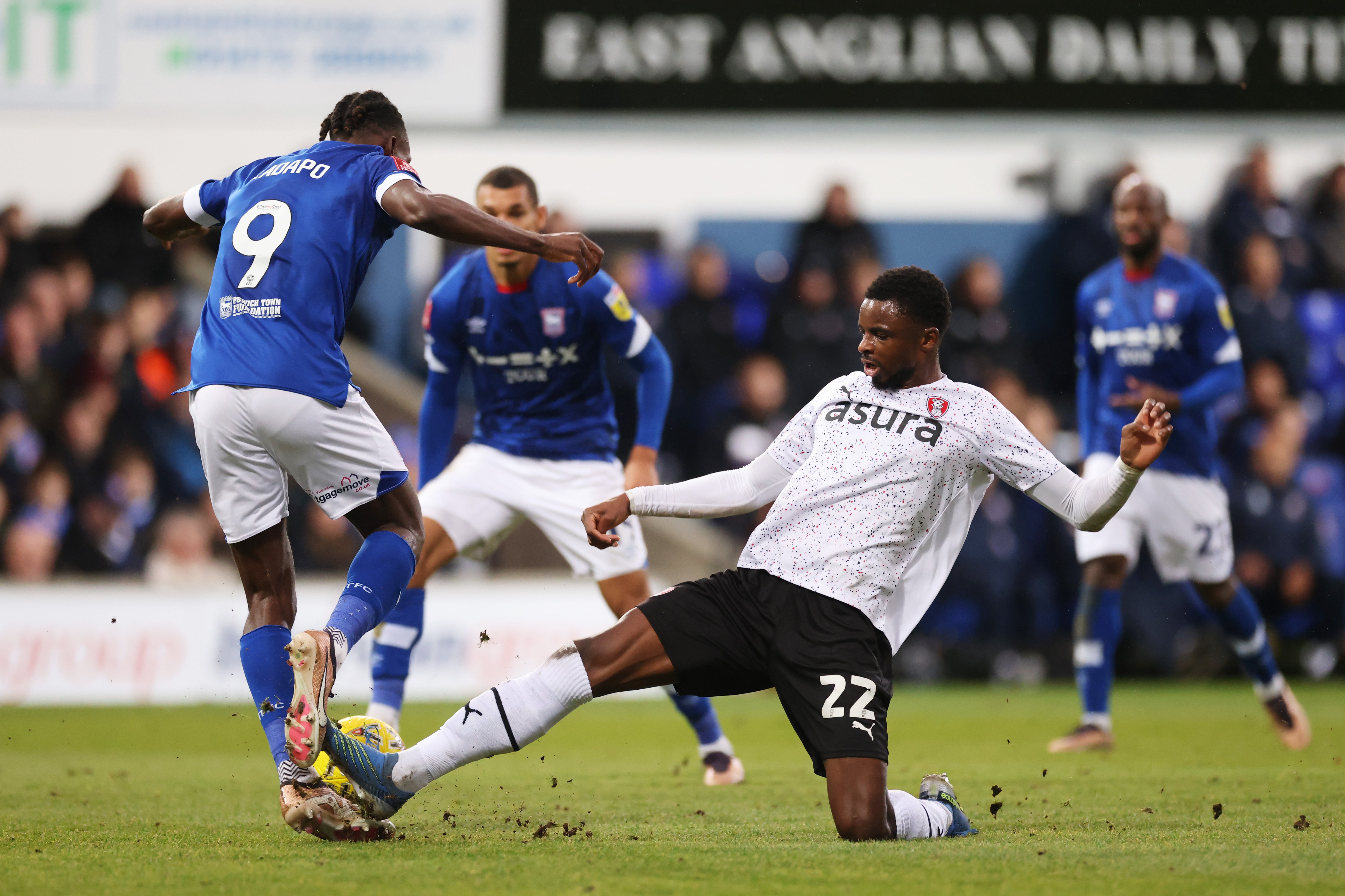 Freddie Ladapo of Ipswich Town is challenged by Hakeem Odoffin of Rotherham United