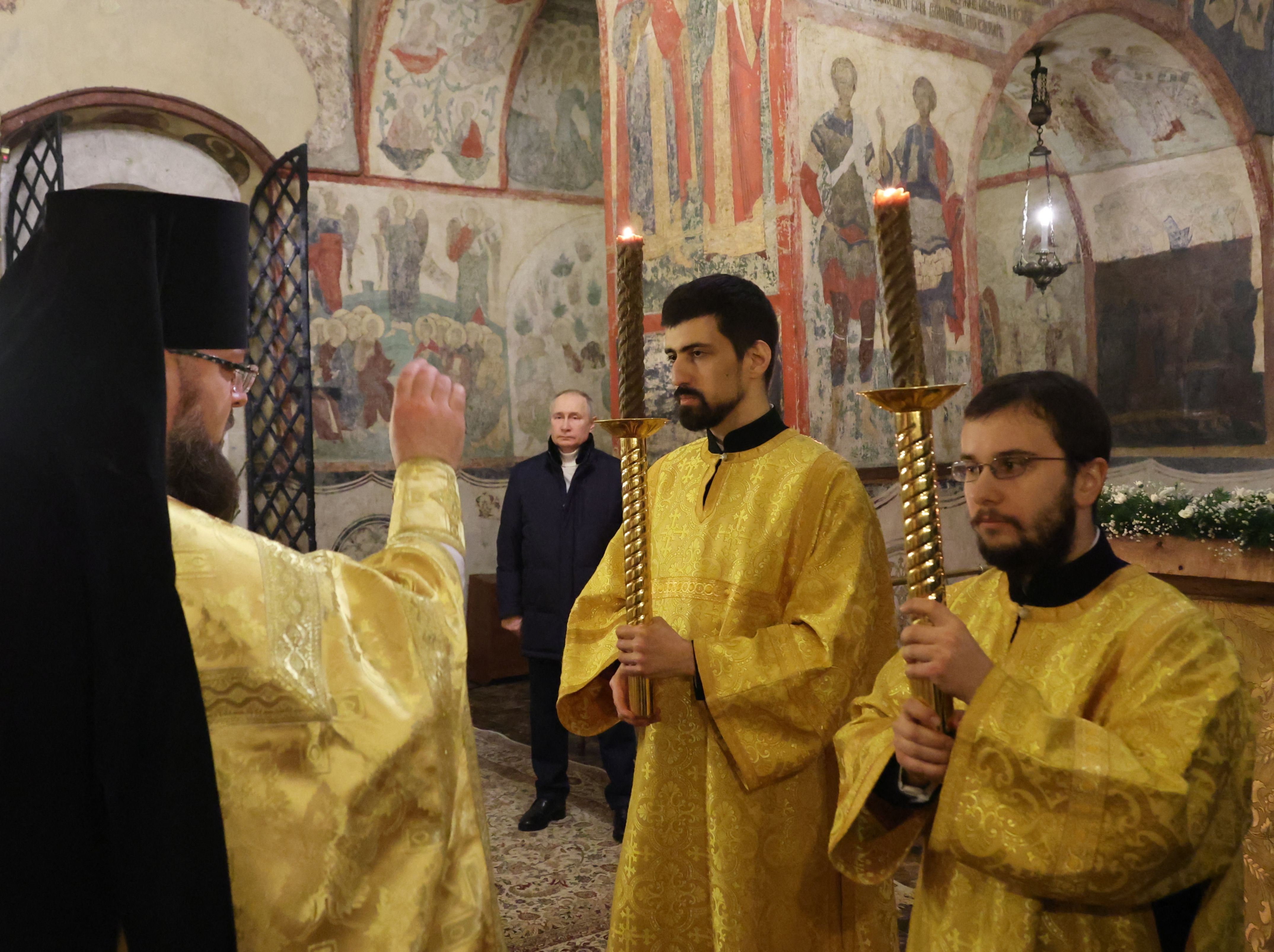 Putin attends an Orthodox Christmas mass in the Cathedral of the Annunciation at the Kremlin