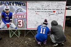 Bills Mafia honors Hamlin with giant get-well card, more