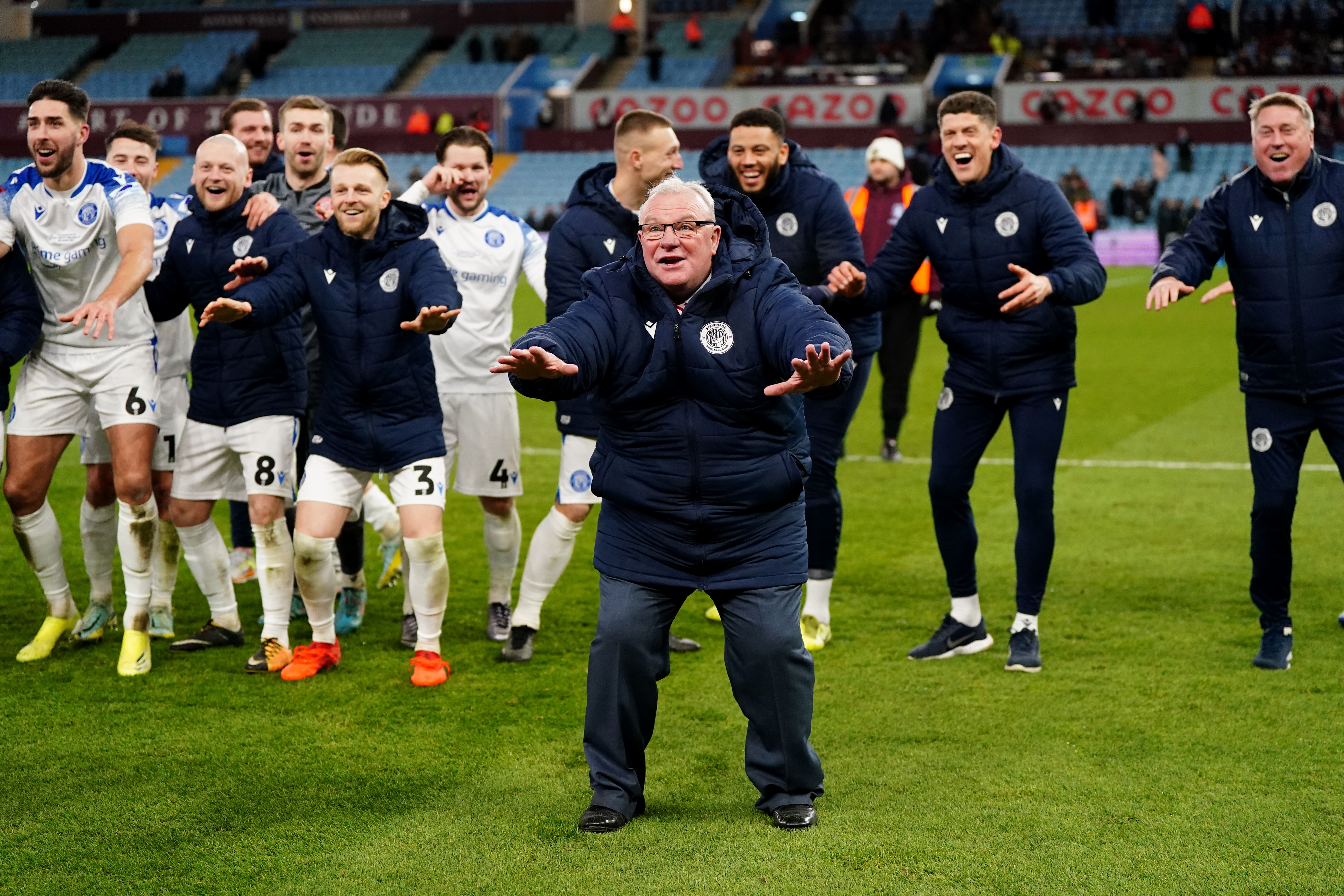 Steve Evans celebrated the victory over Villa (PA)