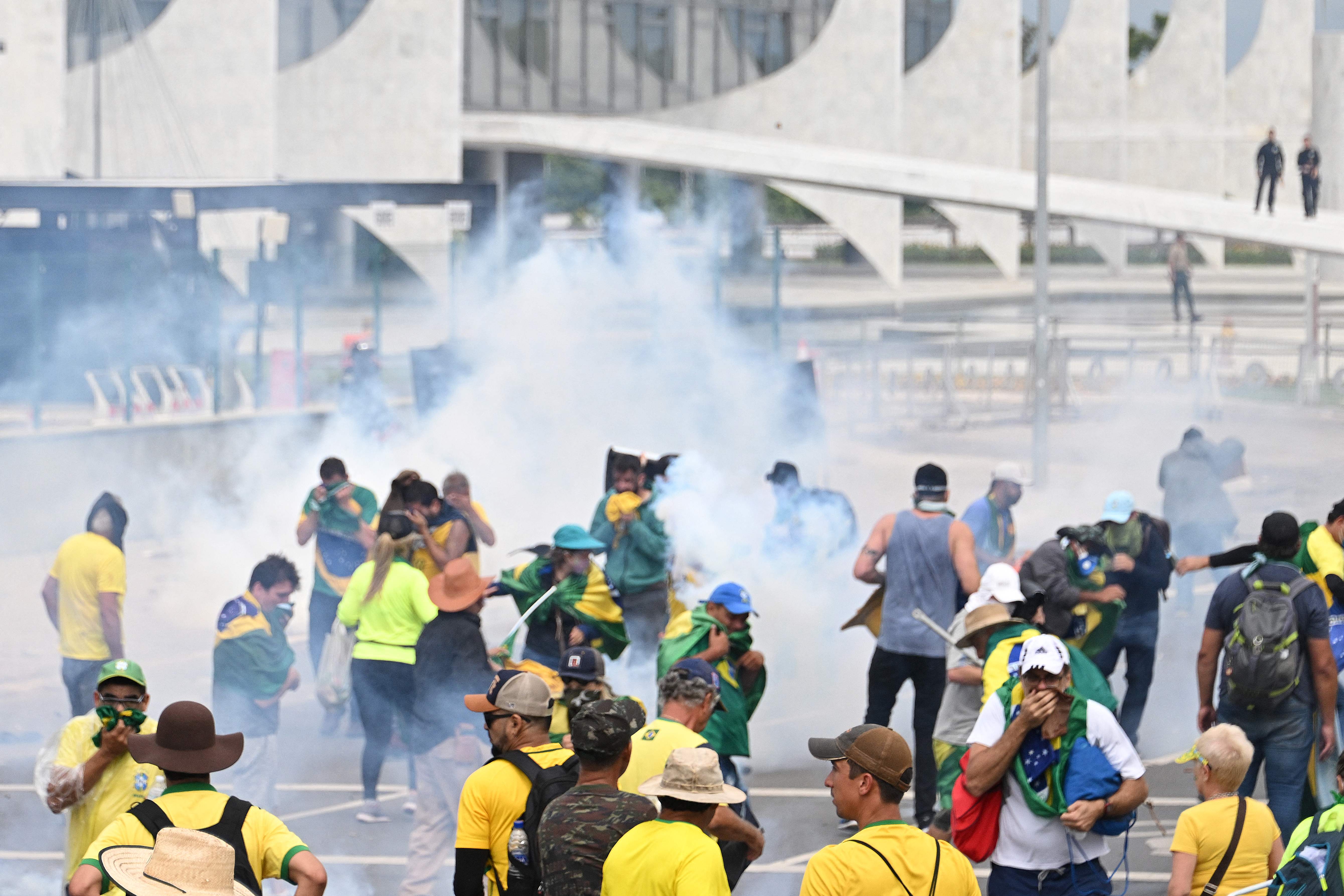 Supporters of Brazilian former president Jair Bolsonaro clash with police in Brasilia