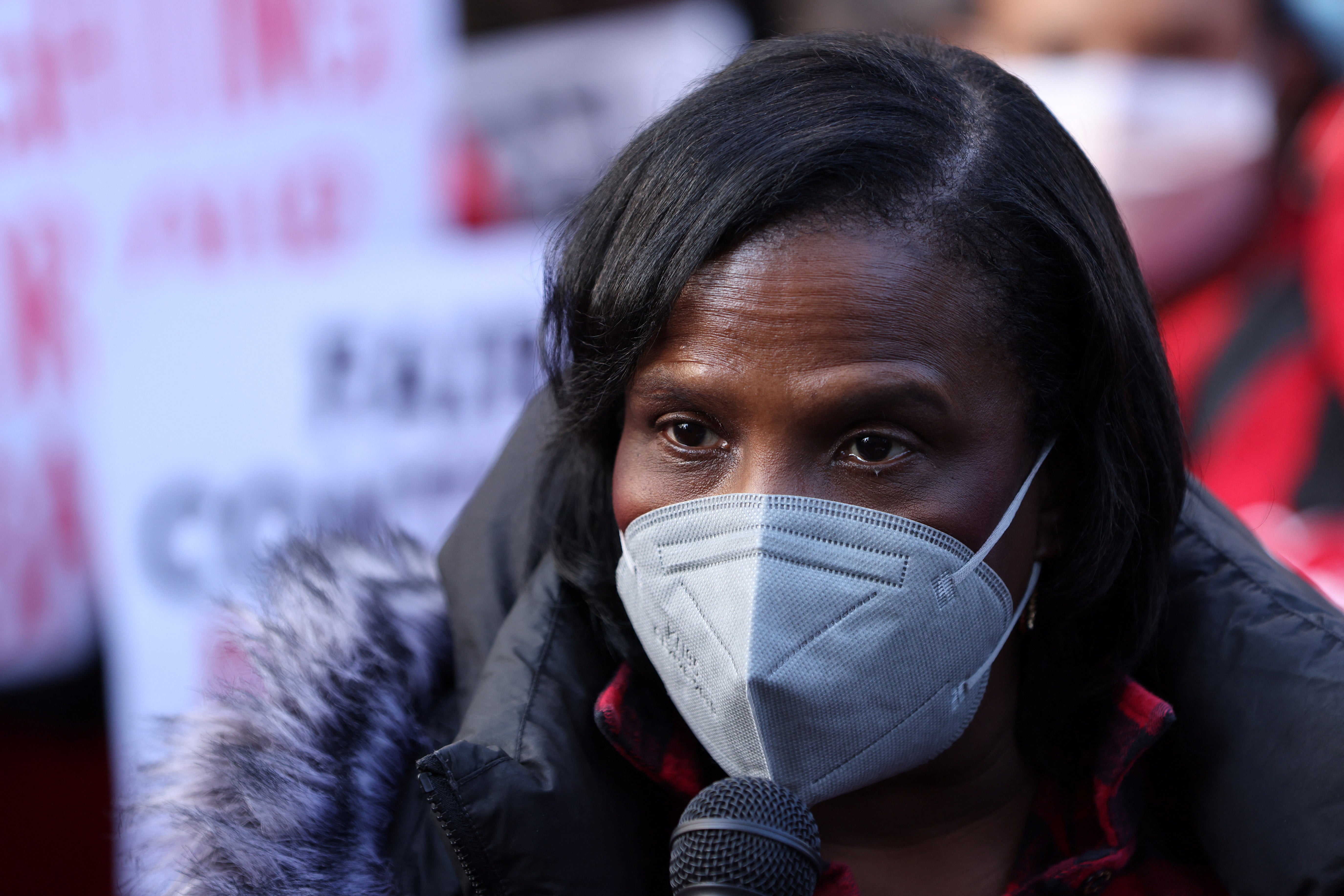 New York State Nurses Association president Nancy Hagans addresses striking workers and members of the press outside Mount Sinai hospital on 9 January.