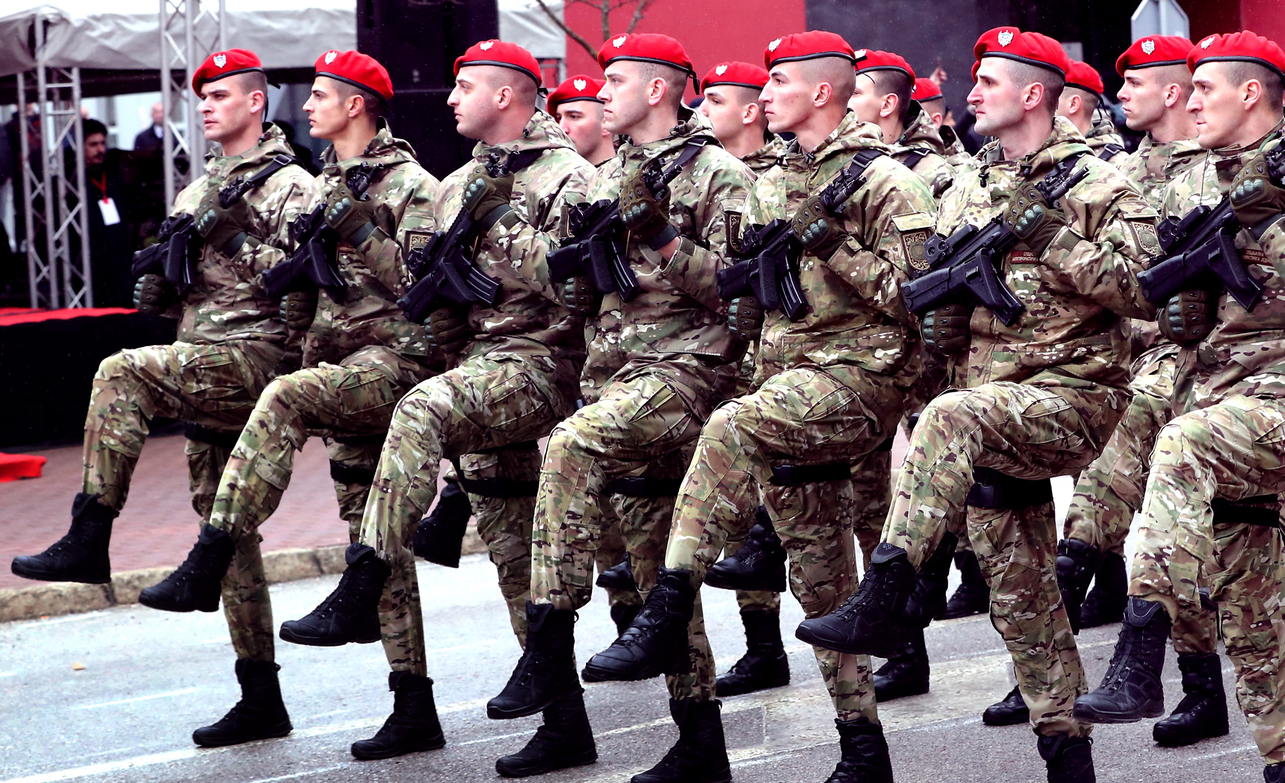 Bosnian Serb soldiers march in a parade this week as tensions rise between Serbia and Kosovo with bitter accusations, recriminations and sectarian clashes