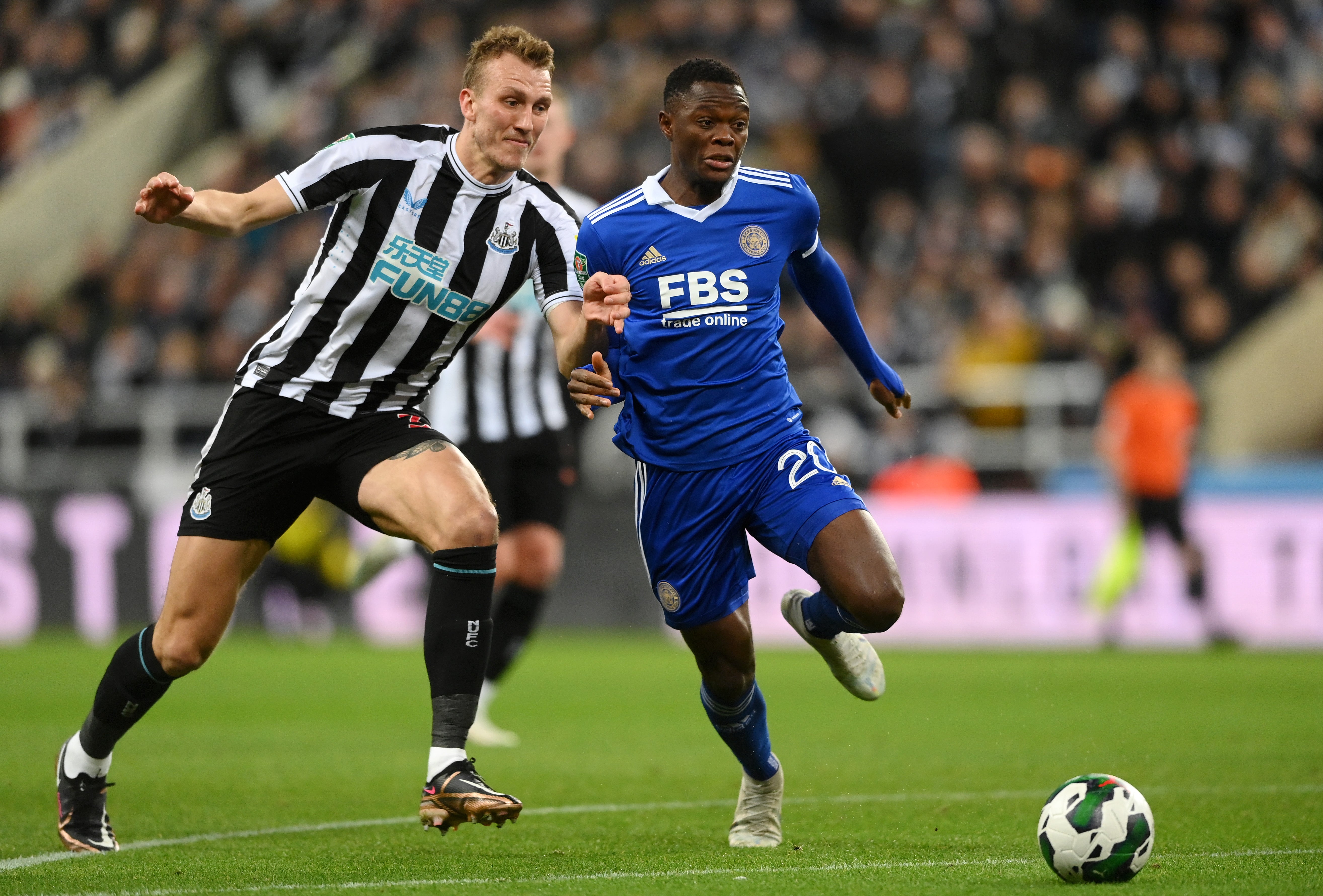 Dan Burn challenges Leicester’s Patson Daka