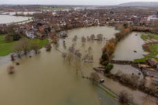 Flood warnings issued as heavy rain and 60 mph wind expected in parts of UK